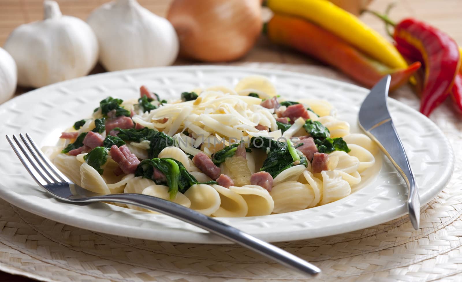 pasta orecchiette with smoked meat and spinach