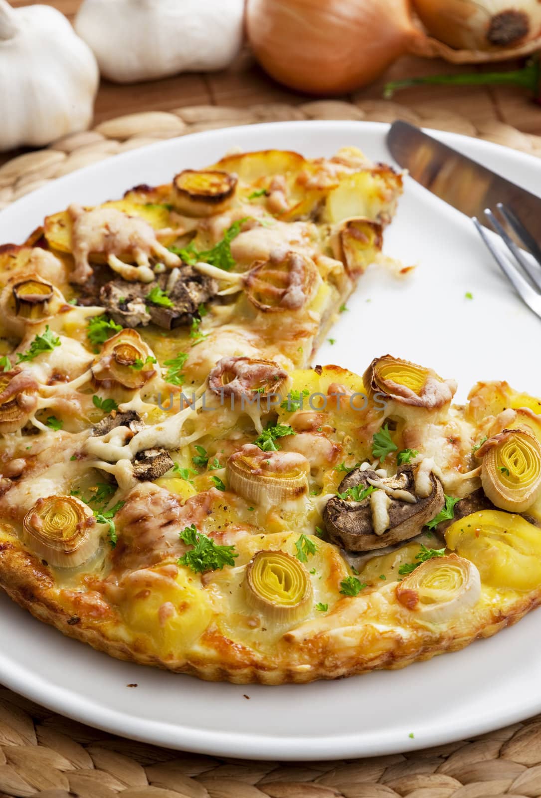 potato cake with champignons and leek
