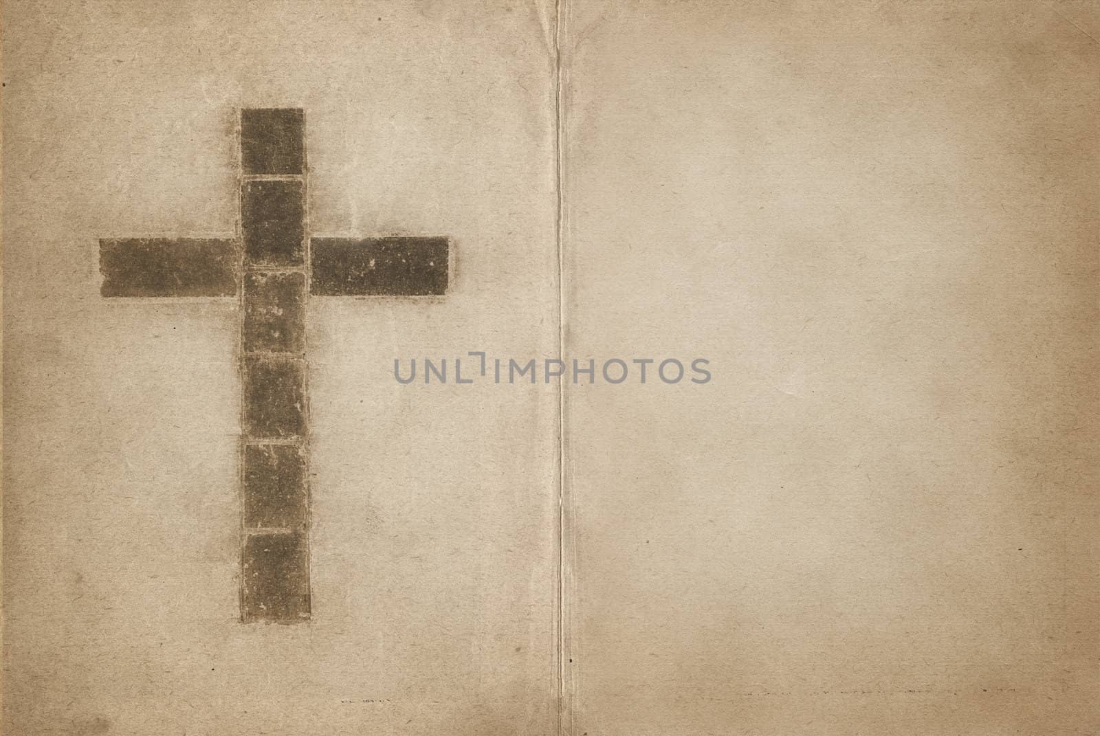great image of a christian cross in old book