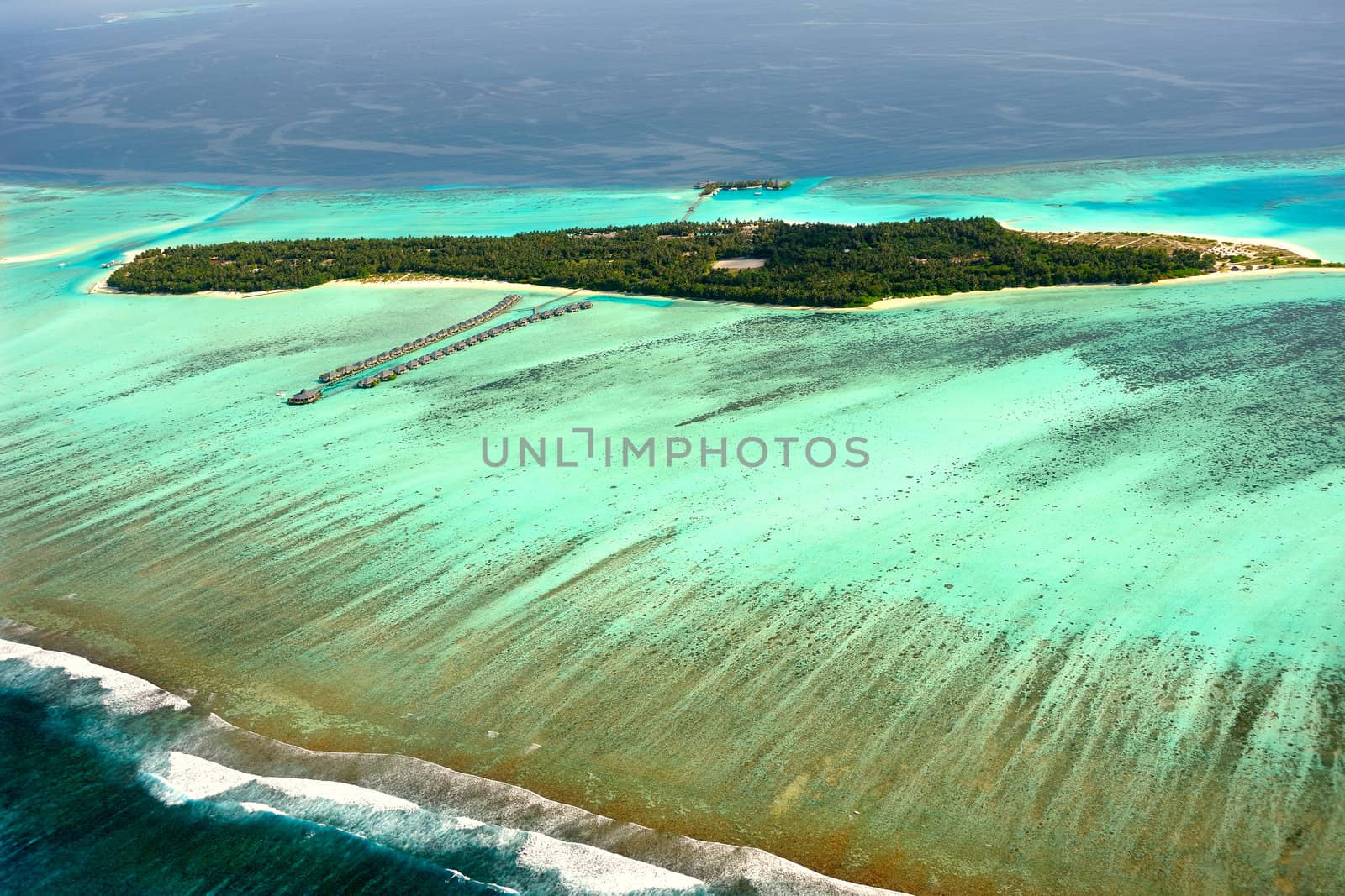 Multi color ocean near Maldives