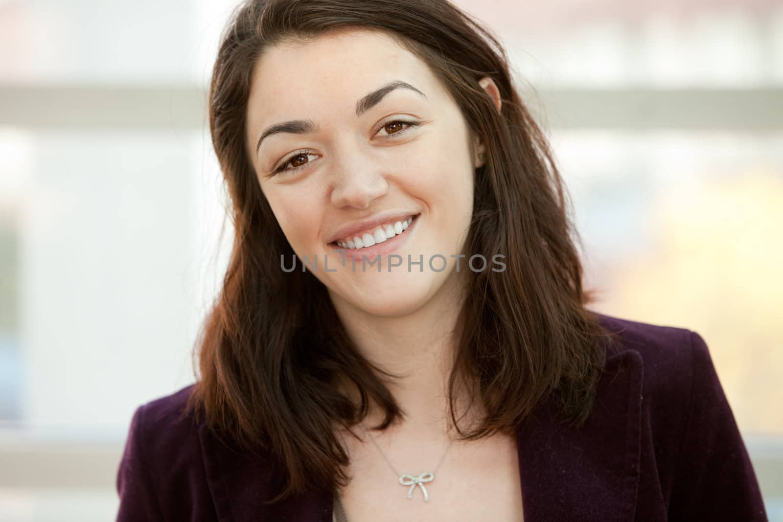 A portrait of a happy young woman