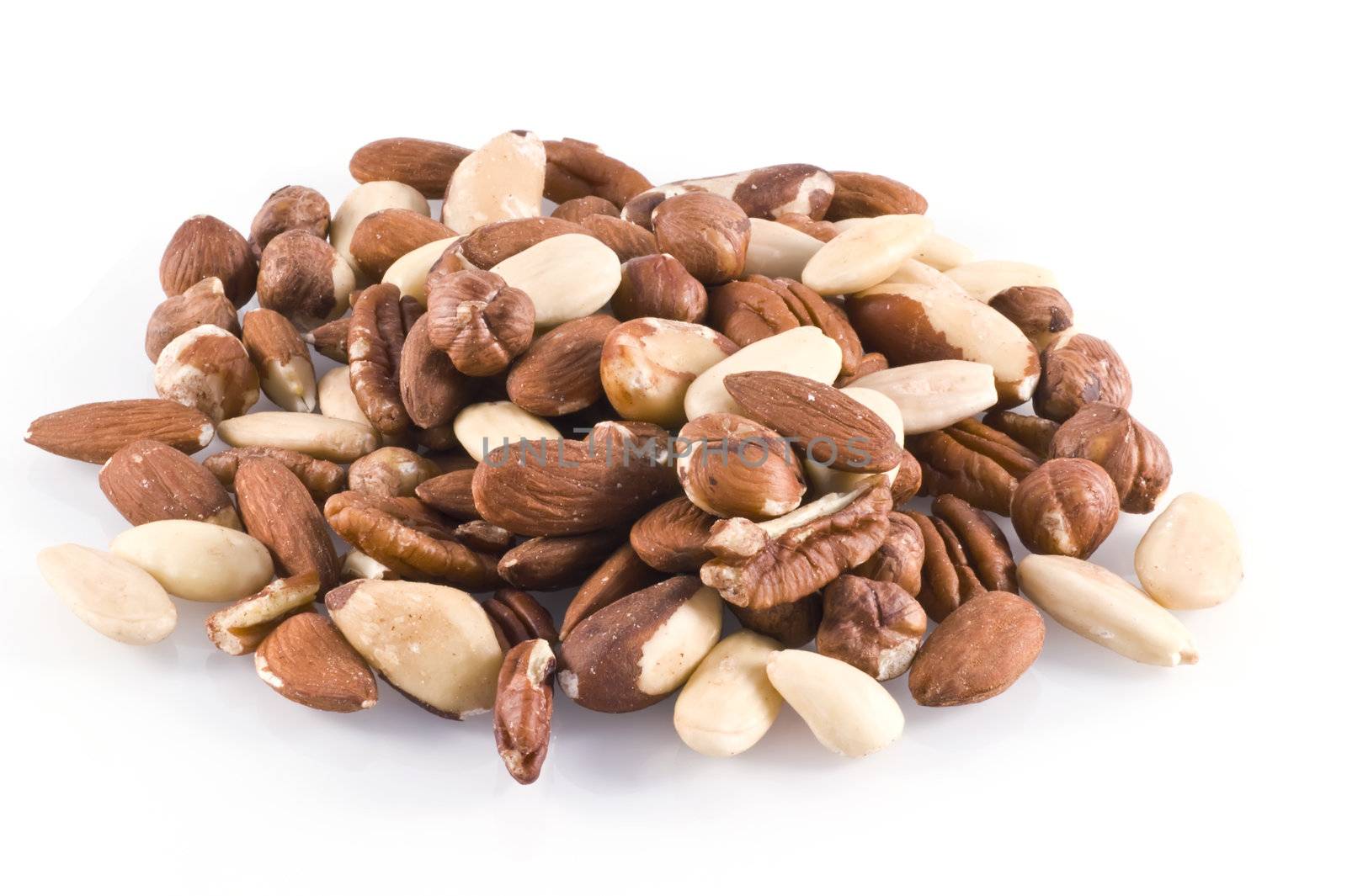 Different kinds of nuts; isolated on white.