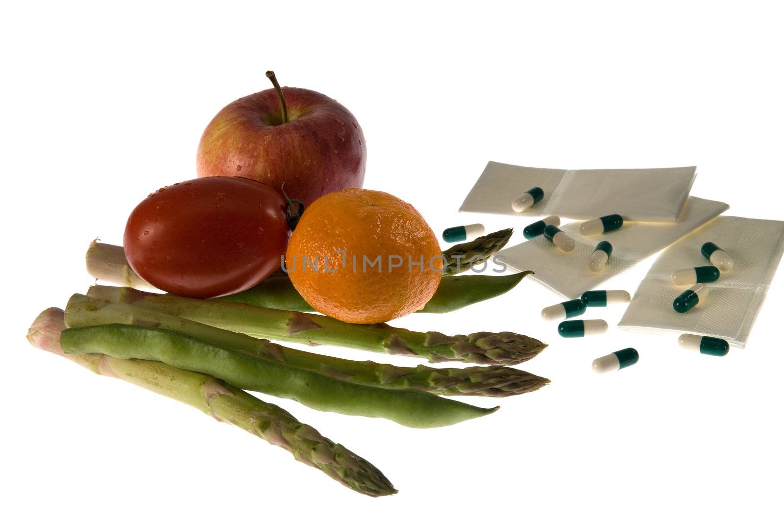 Fruits, vegetables, medicaments and handkerchiefs representing health care.