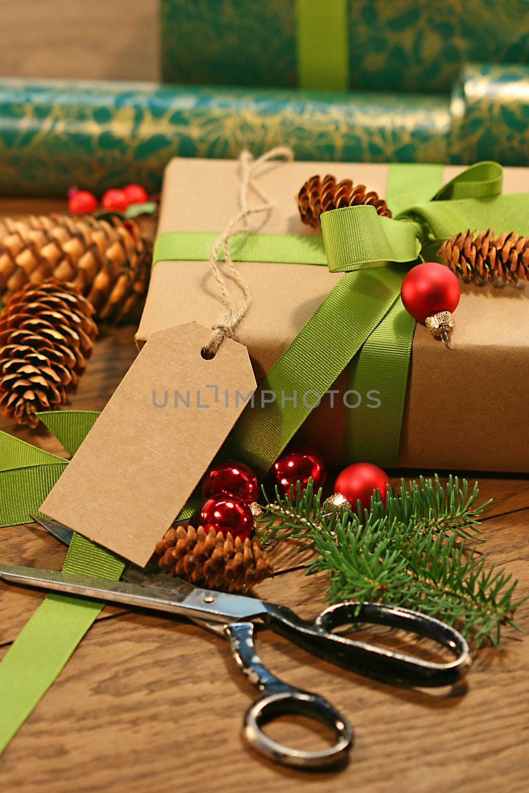 Wrapping gifts for the holidays on oak table