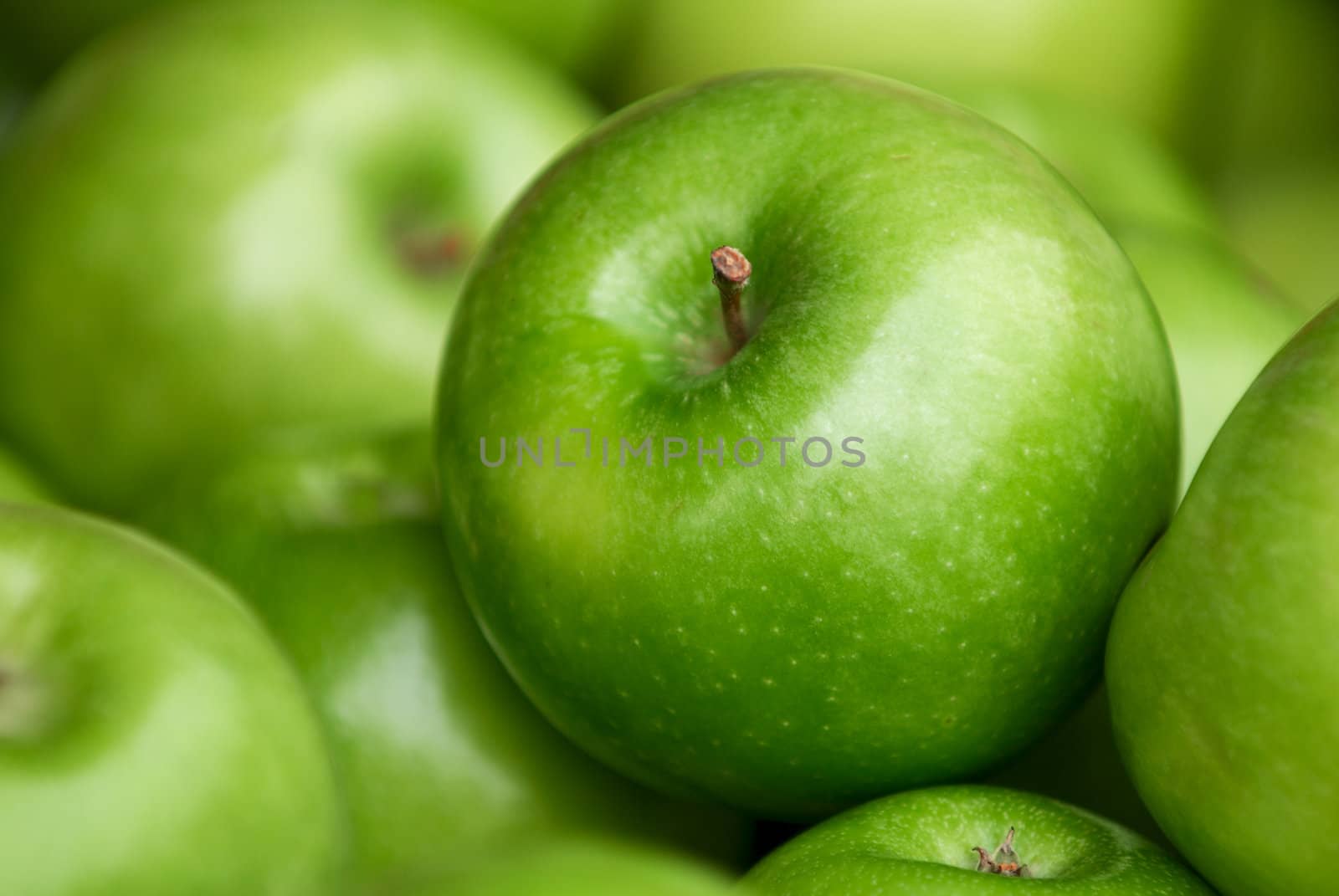 Green delicious apples by Kamensky