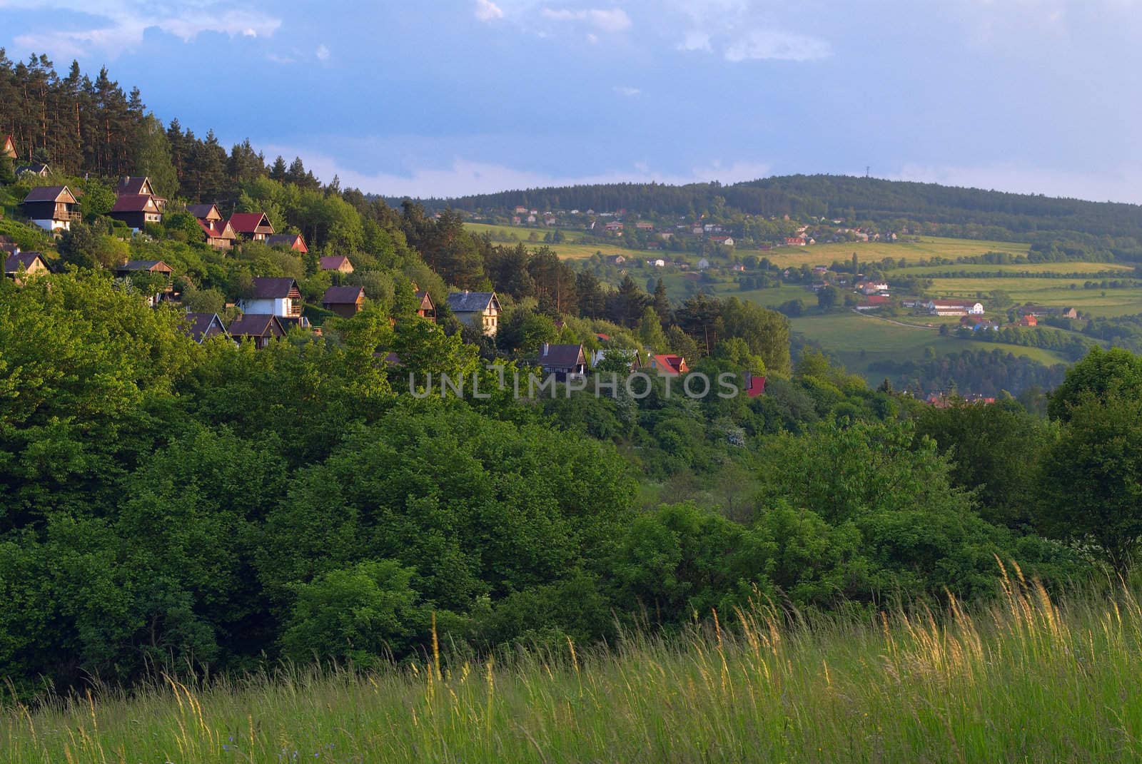 View on the small village located on hills.
