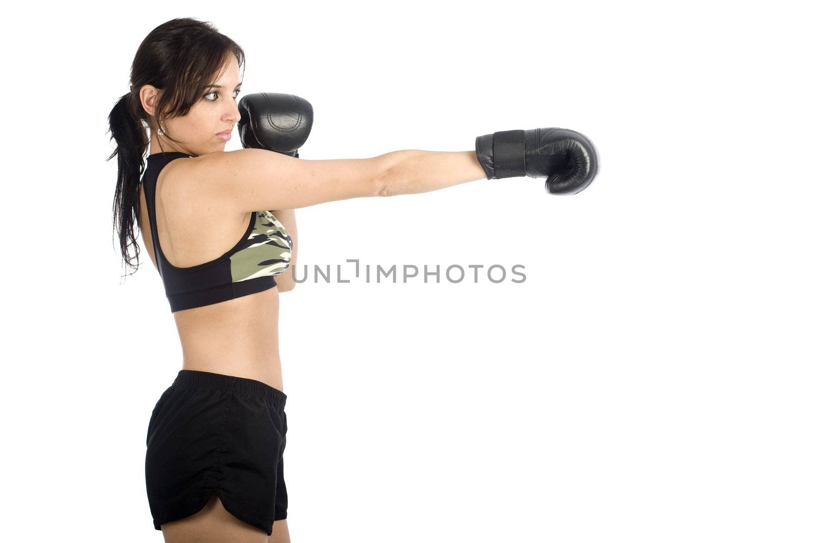 A sexy young hispanic woman wearing a gym outfit, isolated on a white background.