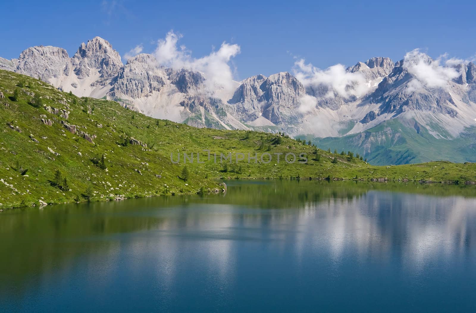 summer view of lake Cavia near San Pellegrino pass, Trentino, Italy 
