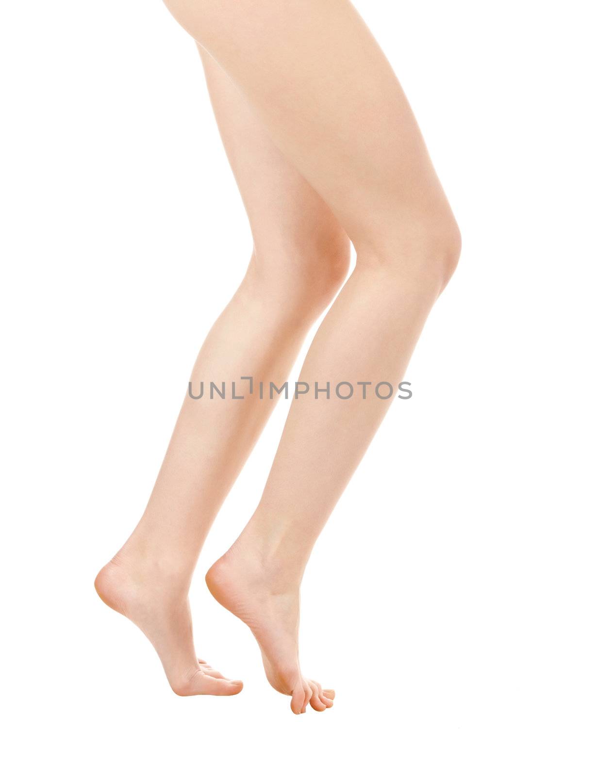 Long pretty woman legs isolated on white background by Nobilior