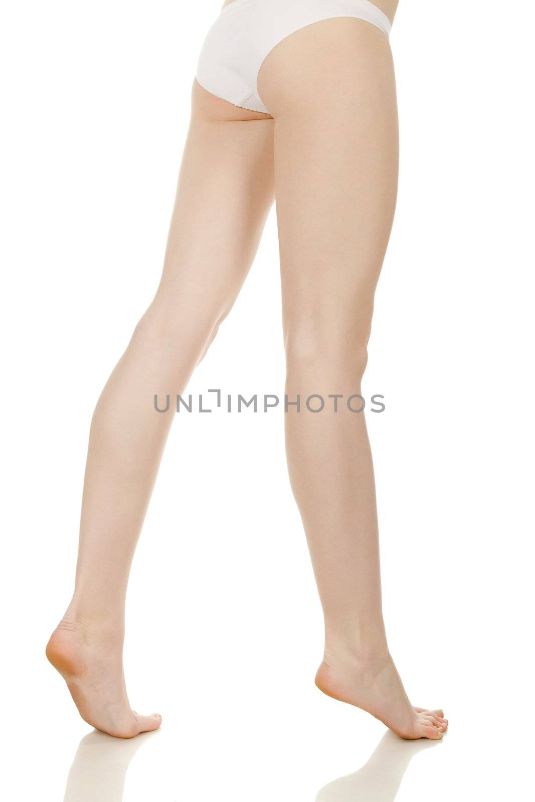 Long pretty woman legs isolated on white background