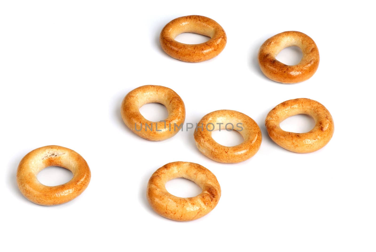 Seven small dry biscuit in the shape of a doughnut