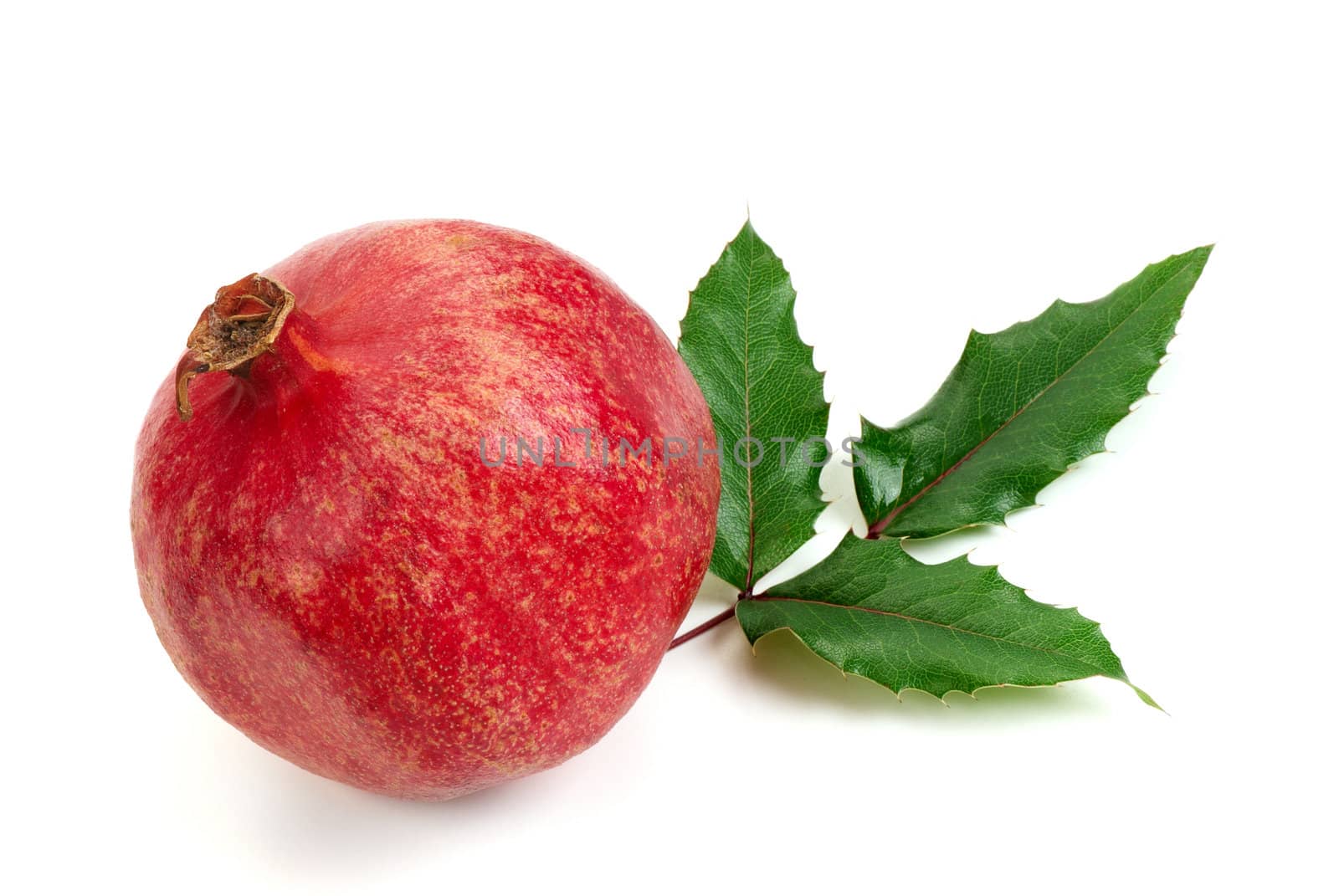 Pomegranate fruit, isolated on white background