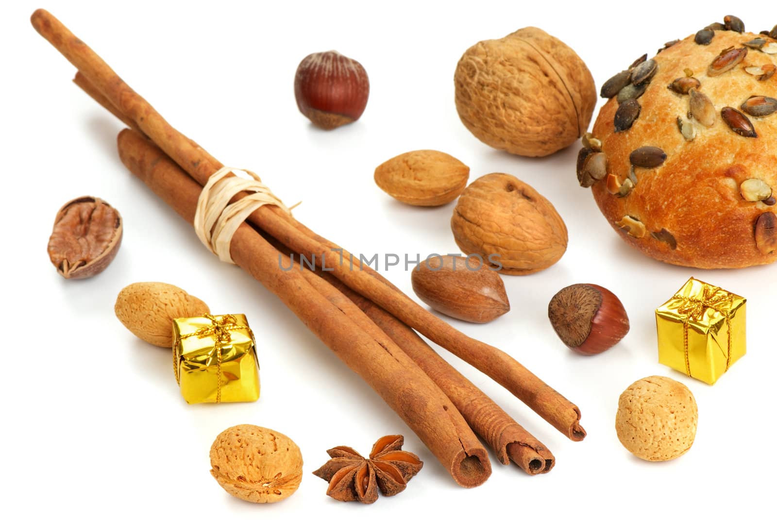 Fresh loaf with spices, nuts and decorative christmas box