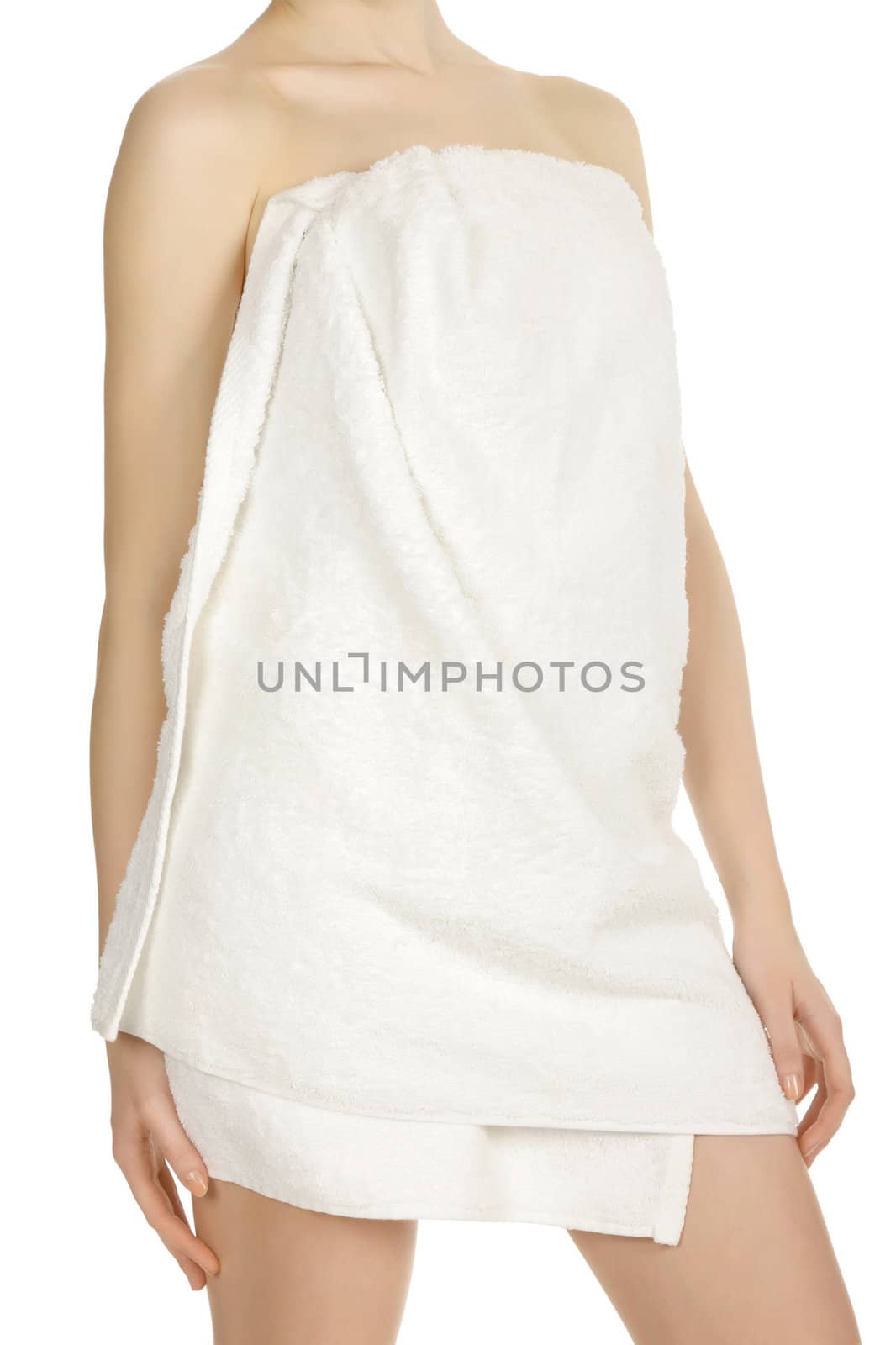 Woman wrapped in a towel posing on white background by Nobilior