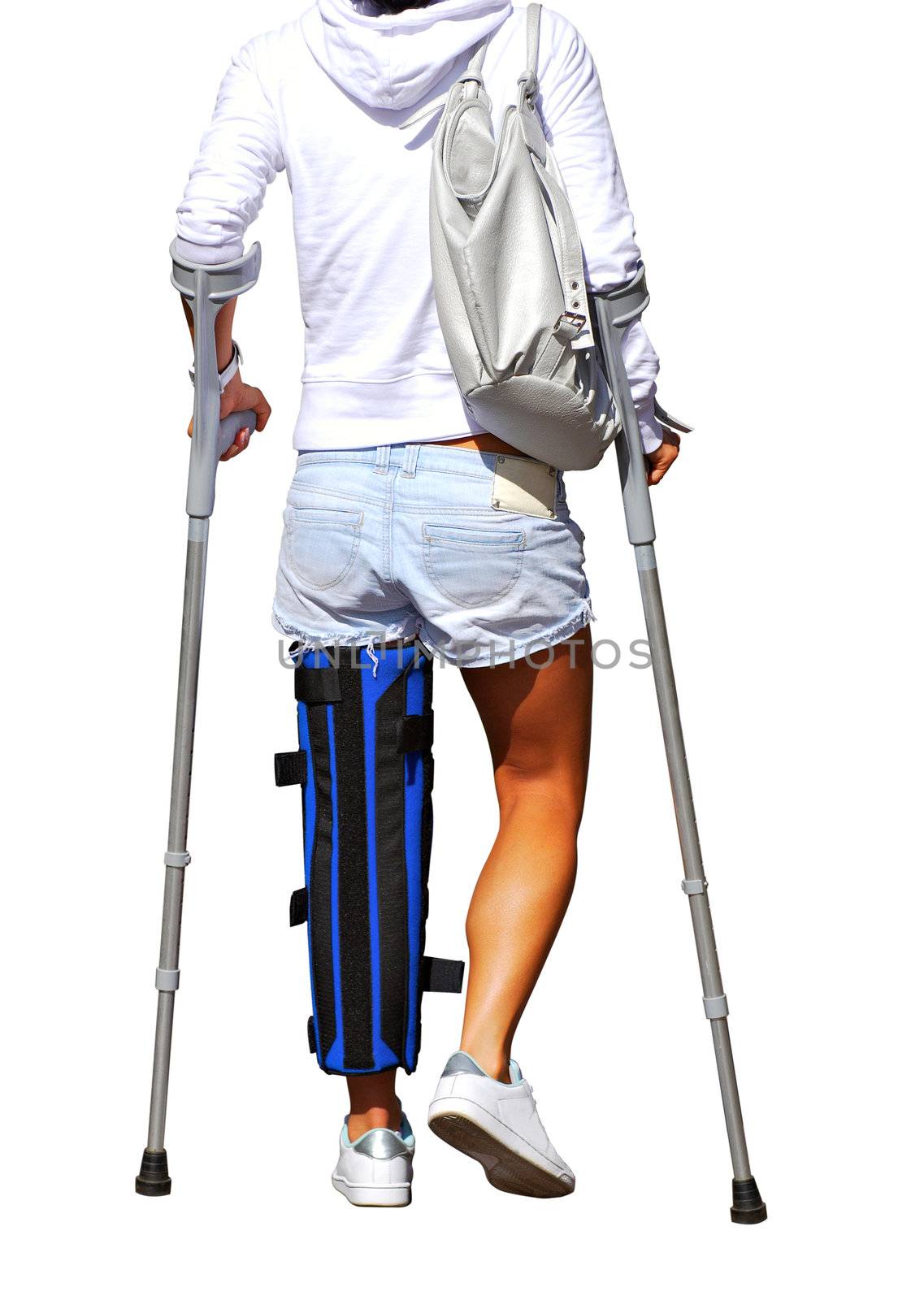 Girl with a broken leg and crutches (white background)
