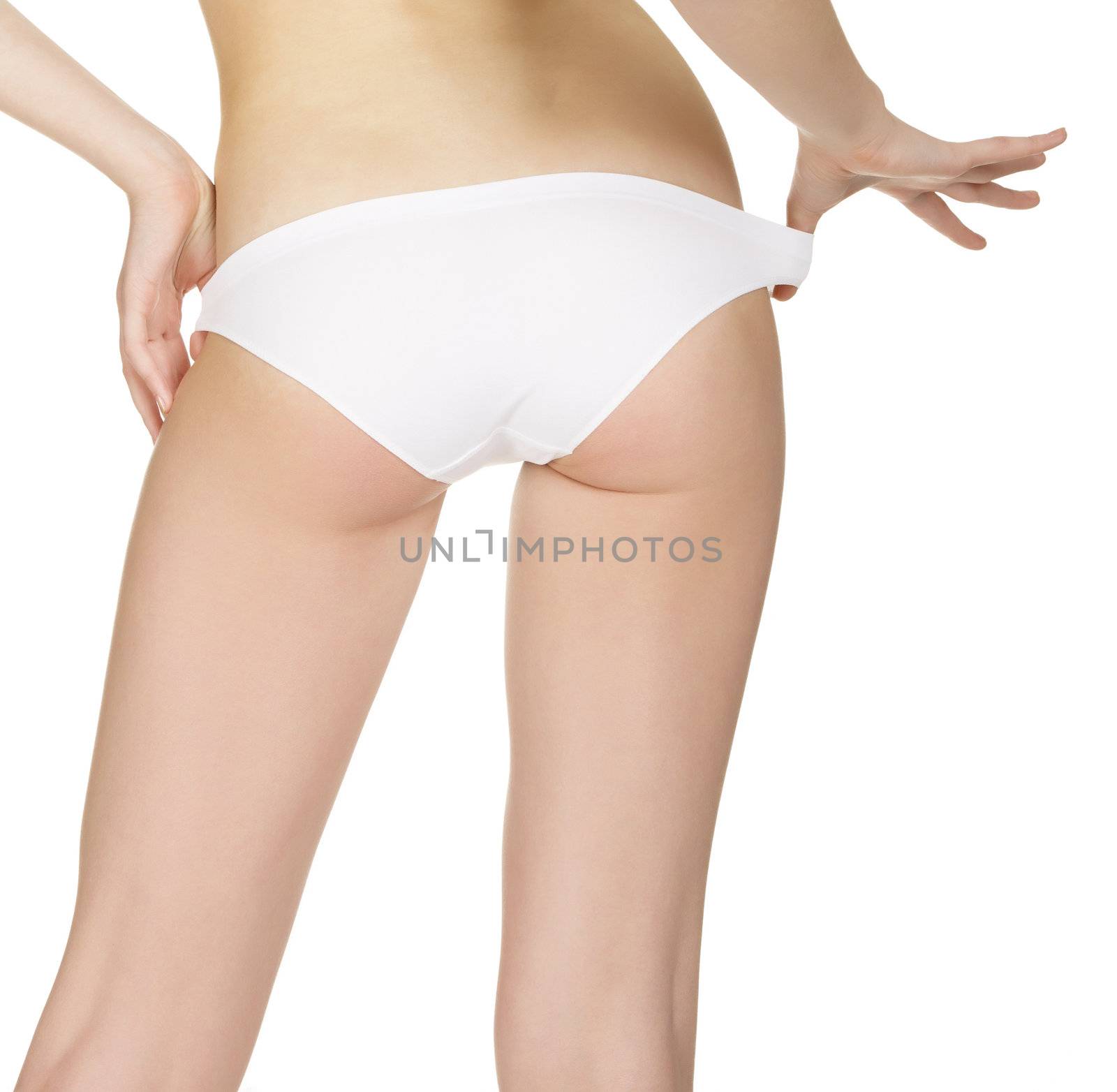 Slim tanned woman's body. Isolated over white background. by Nobilior