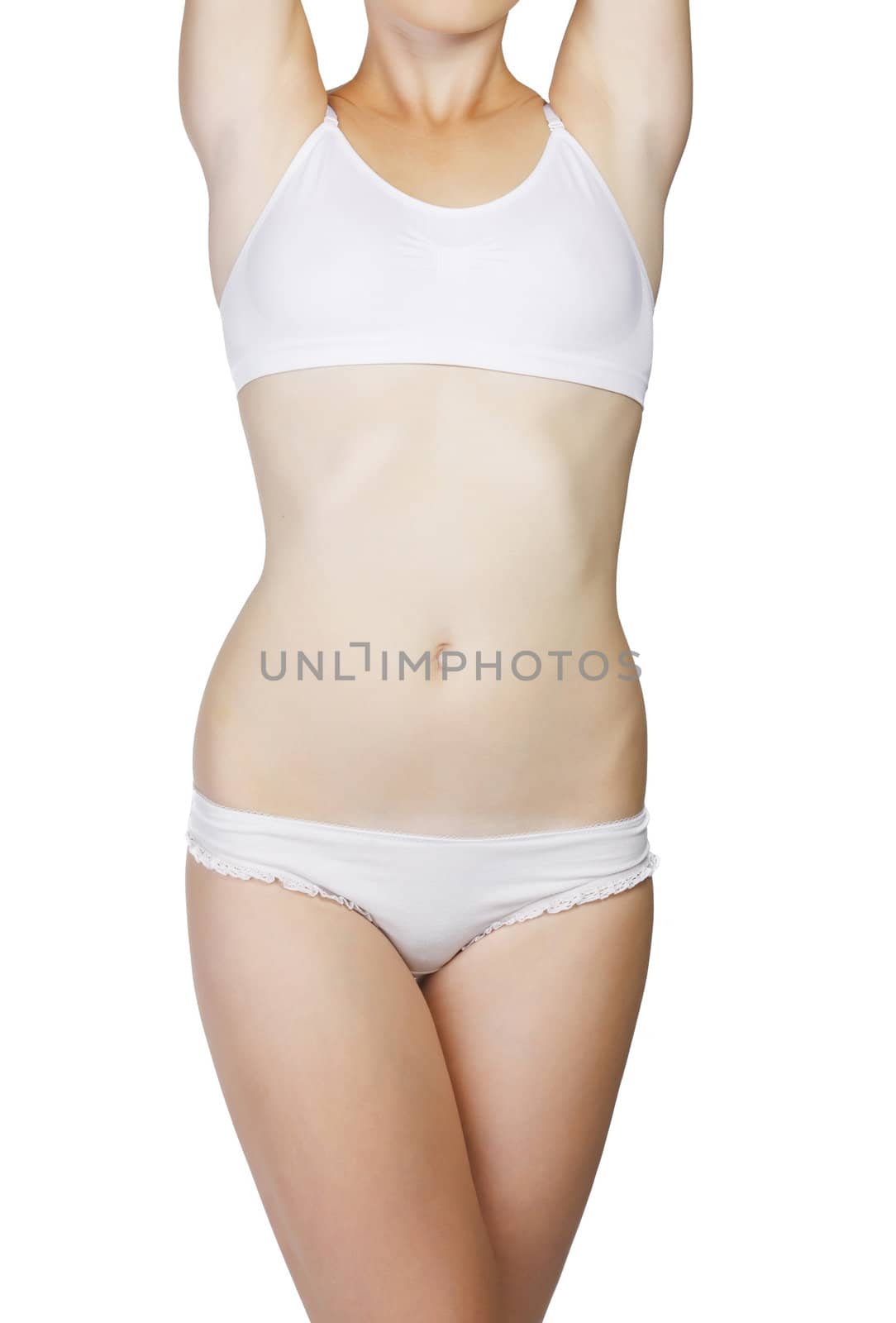 Slim tanned woman's body. Isolated over white background.