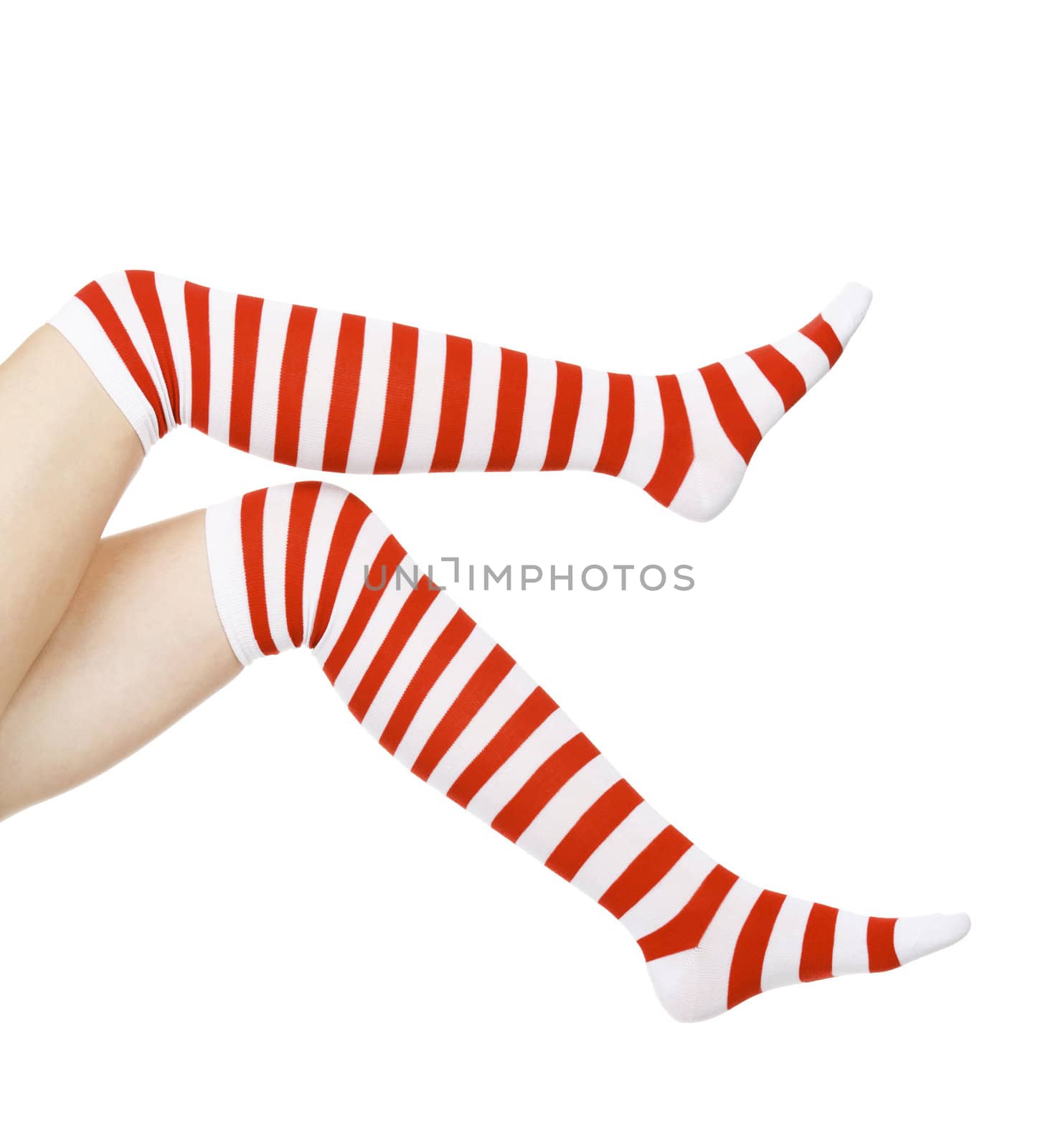 woman legs in color red and white socks, isolated on white by Nobilior