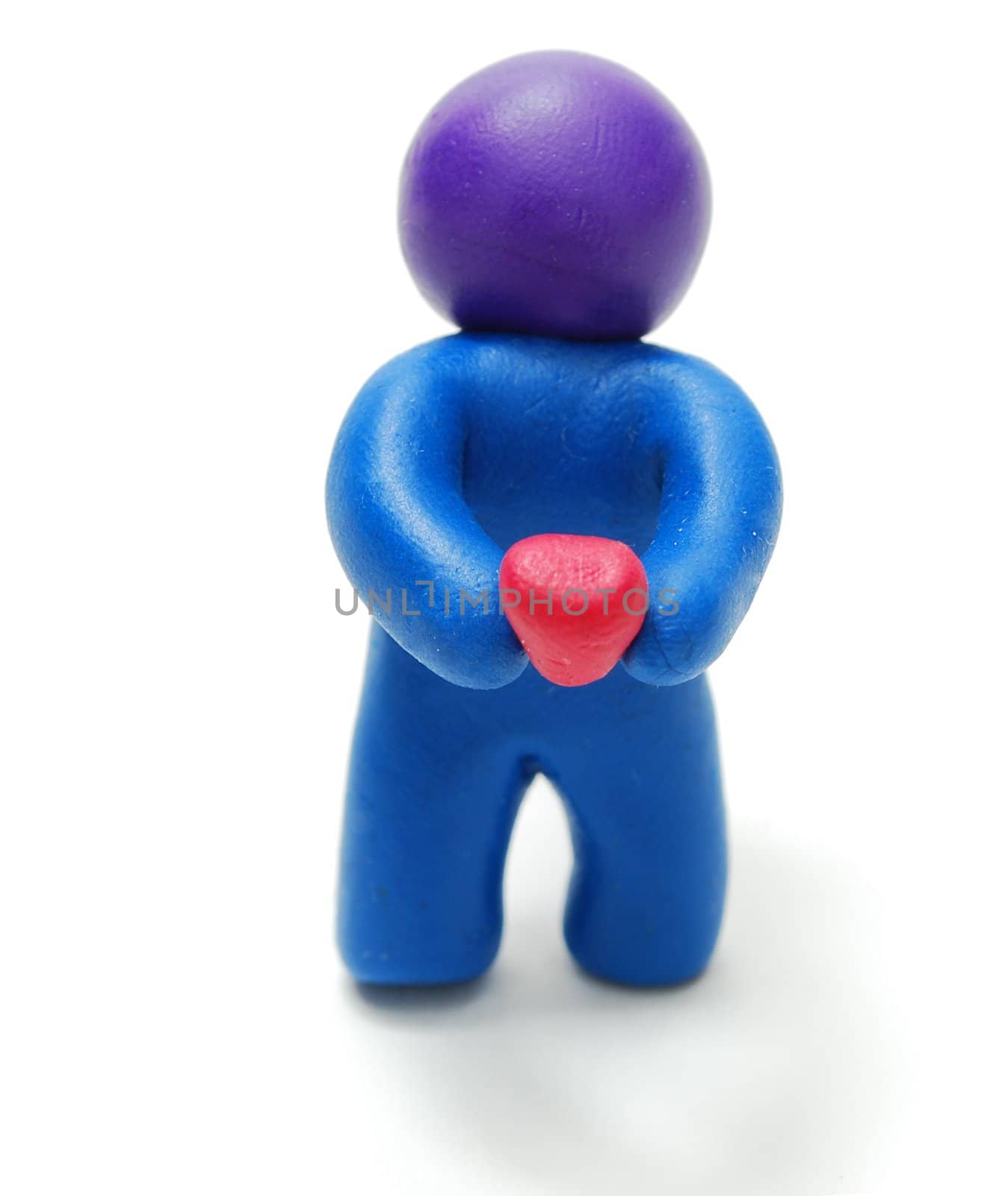 Plasticine Man Holding Heart by Ale059