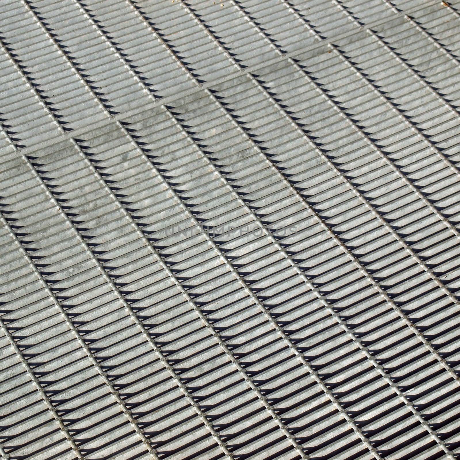 Stainless steel grid mesh useful as a background