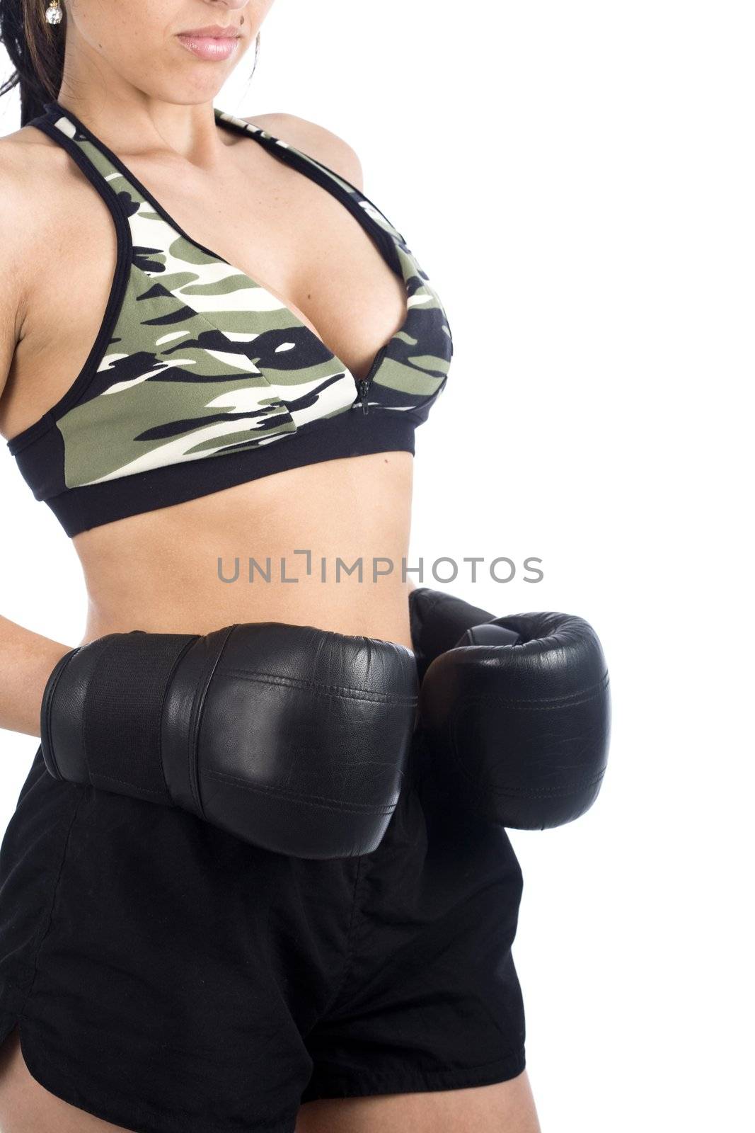 A sexy young hispanic woman wearing a gym outfit, isolated on a white background.