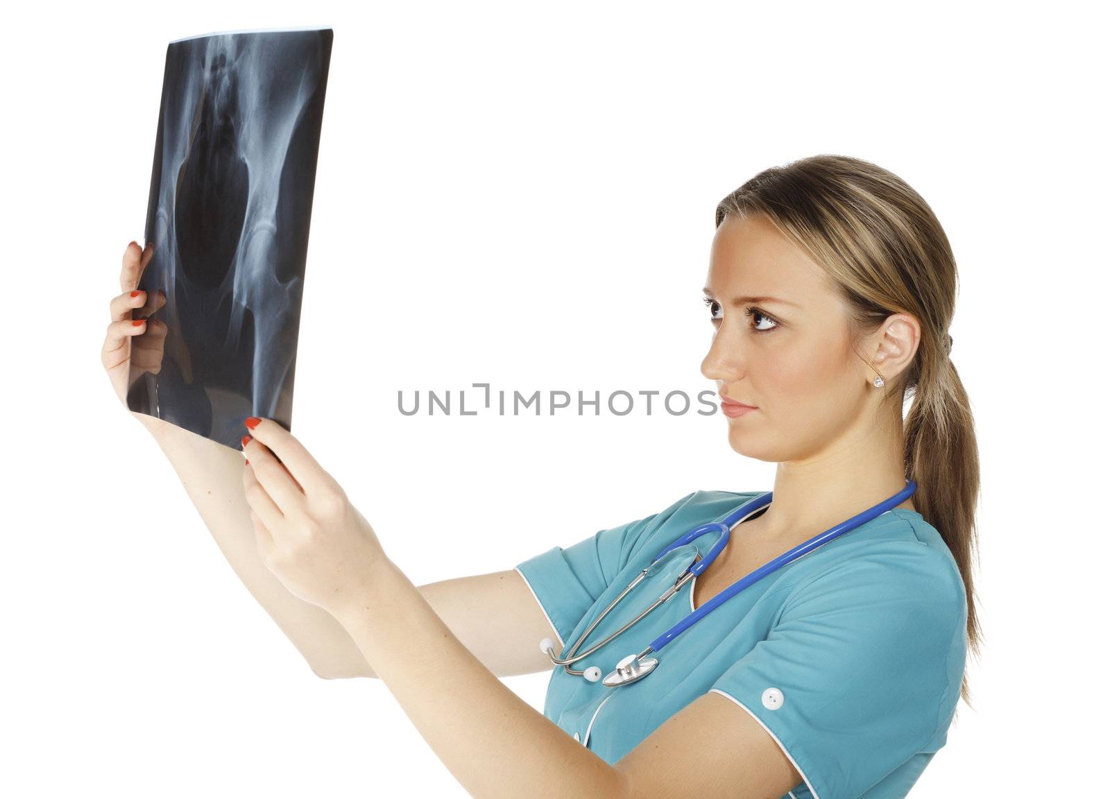 Female doctor checking xray image, isolated on white background. by Nobilior