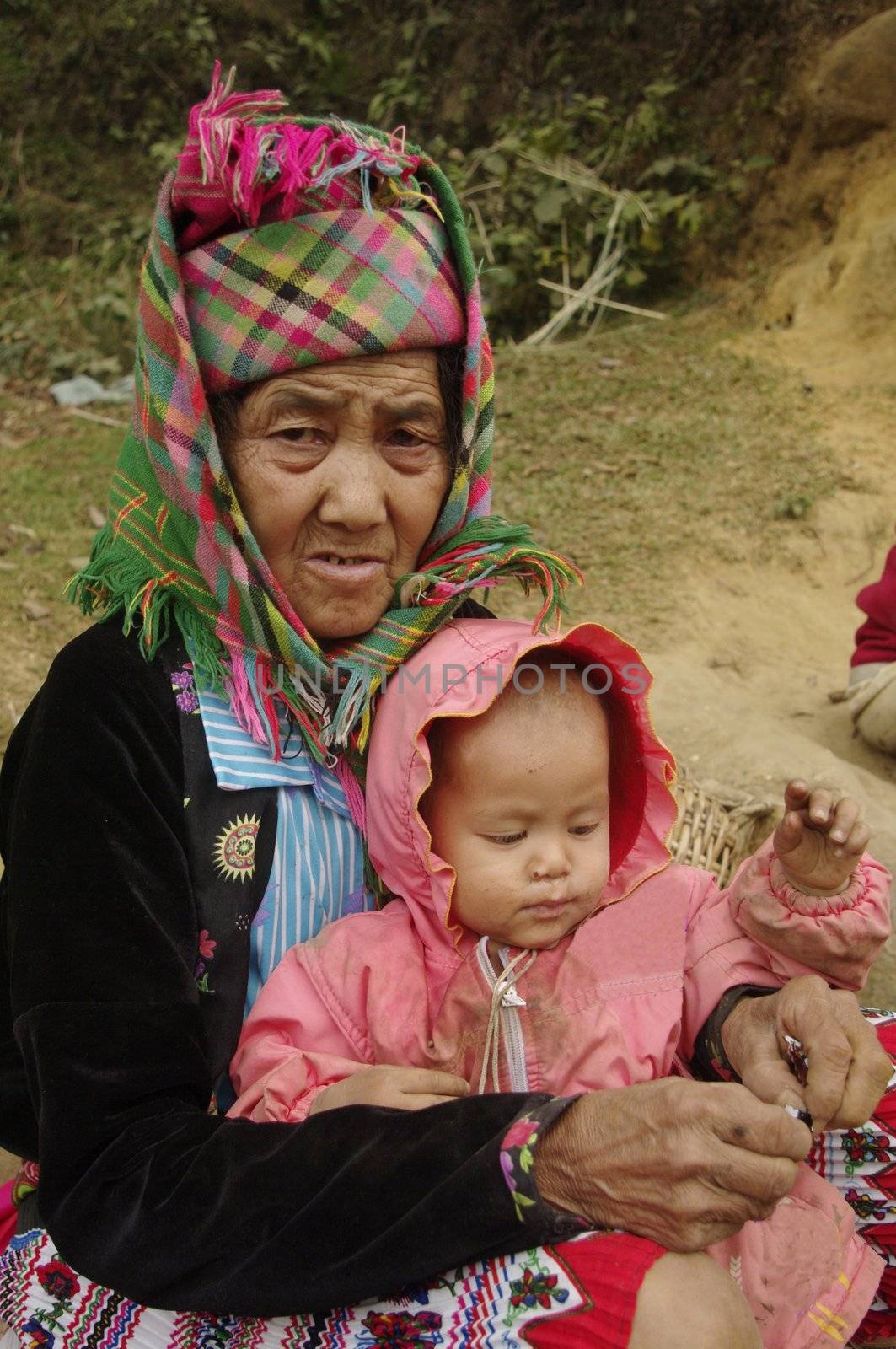 Grandma  flowered Hmong	and her little girl by Duroc