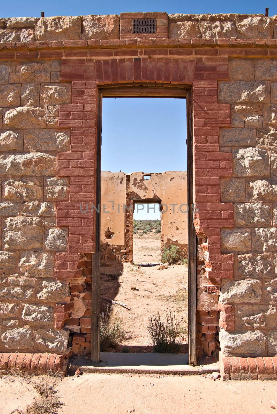 this doorway leads into some old ruins 