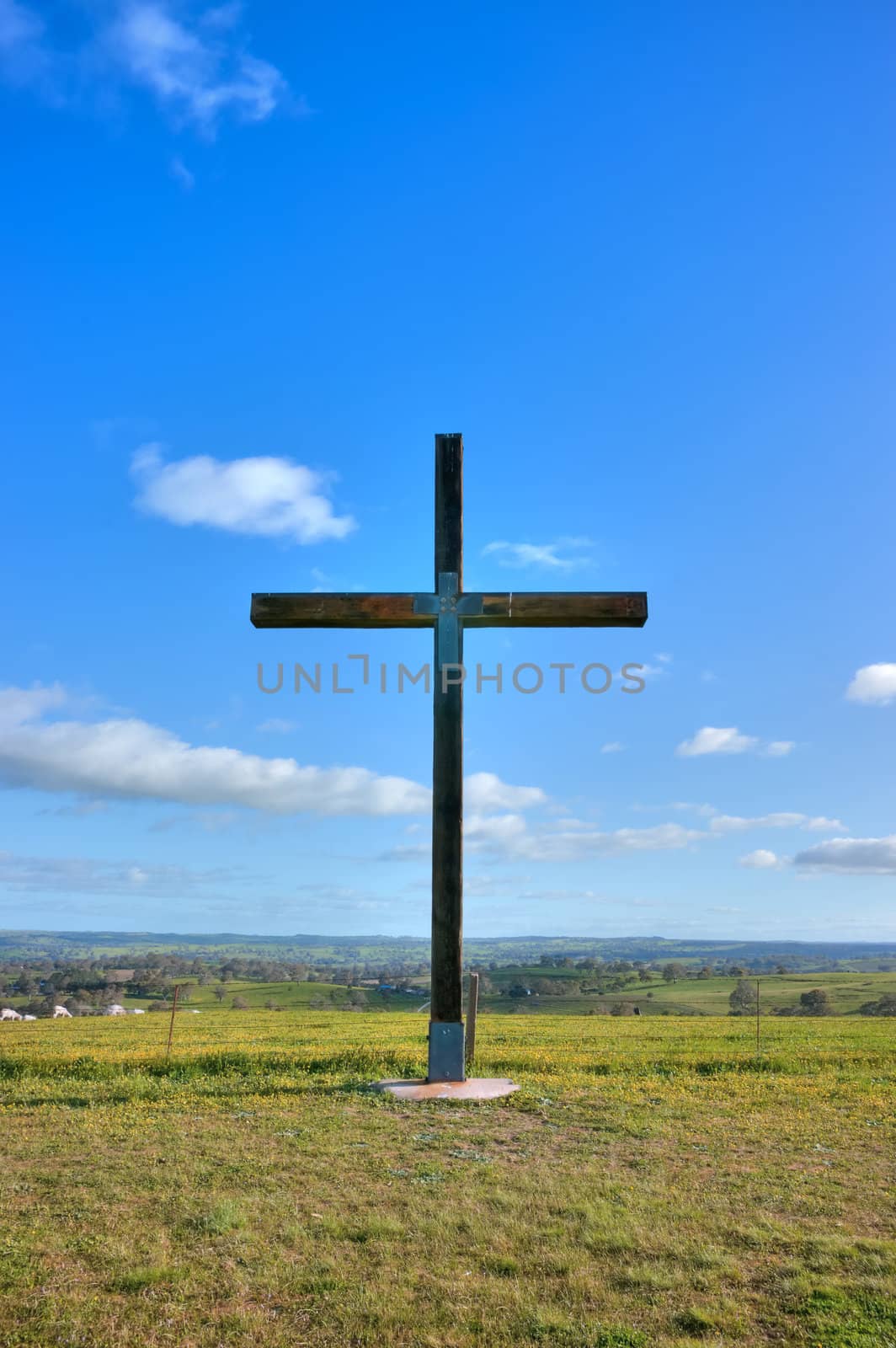 cross of christ in field on a perfect summers day