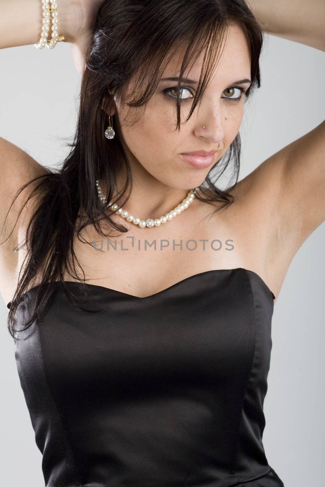 A very sexy young brazilian brunette model shot in a studio.