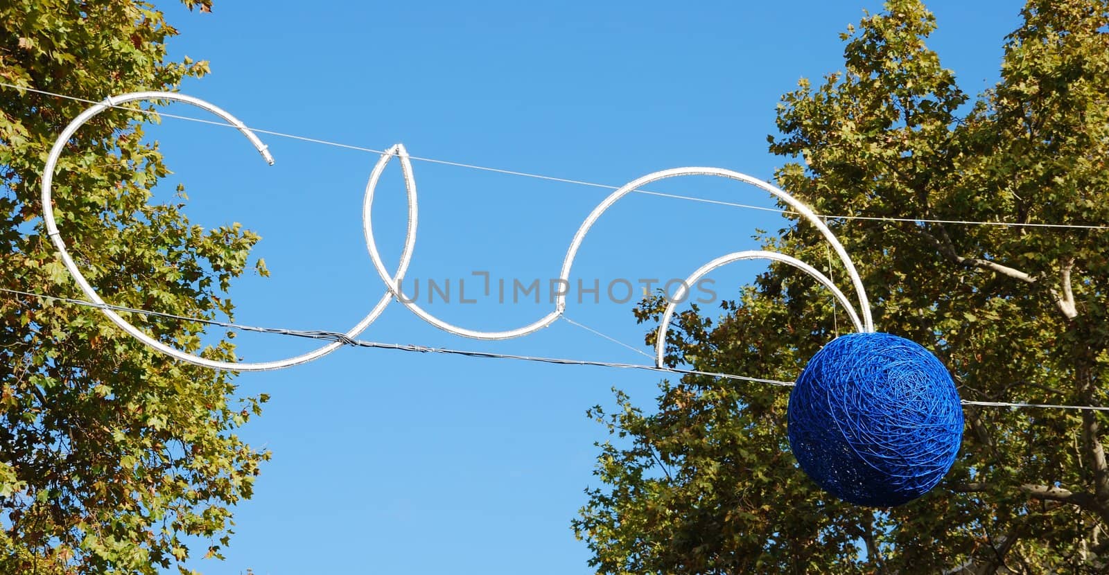 beautiful christmas spirit with blue balls on a local street