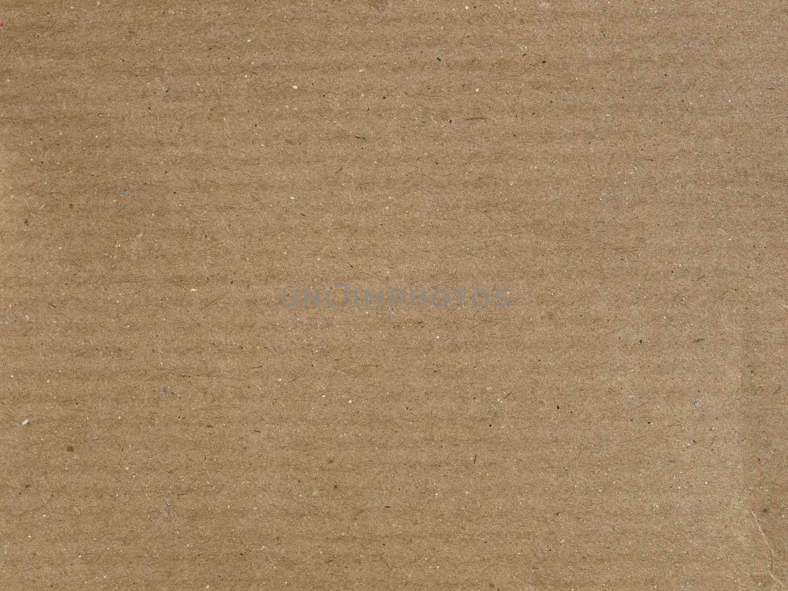 Brown corrugated cardboard sheet useful as a background