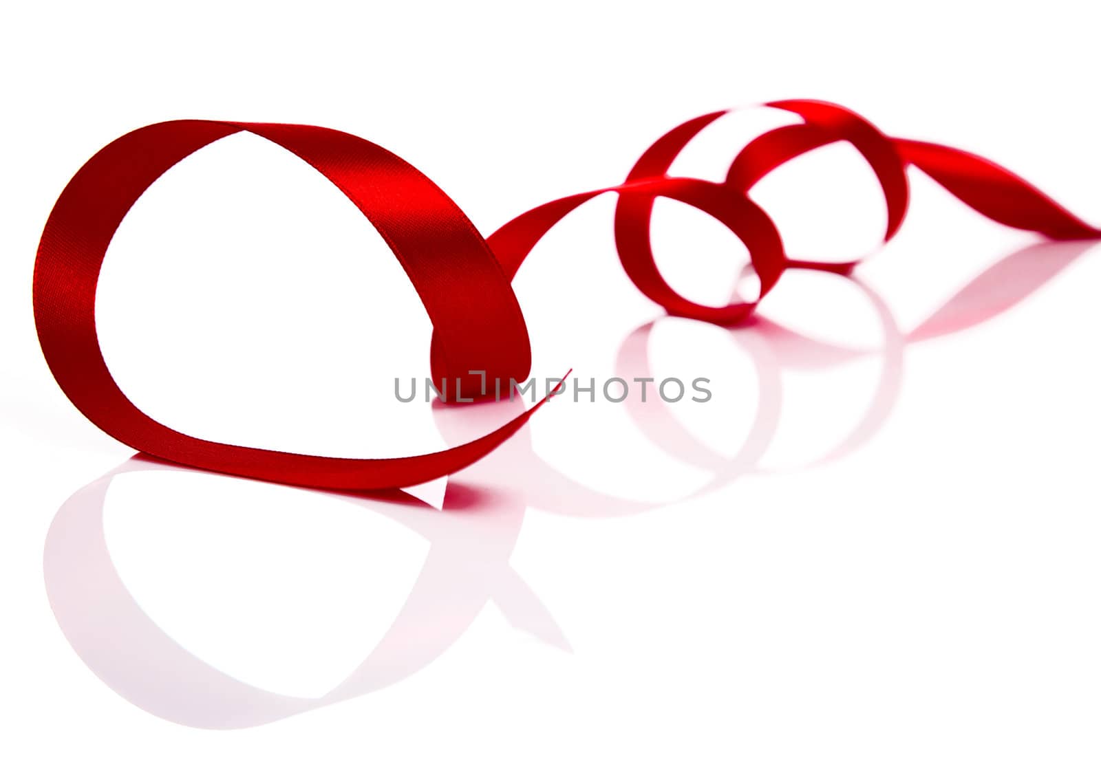 Red Christmas ribbon isolated on white background