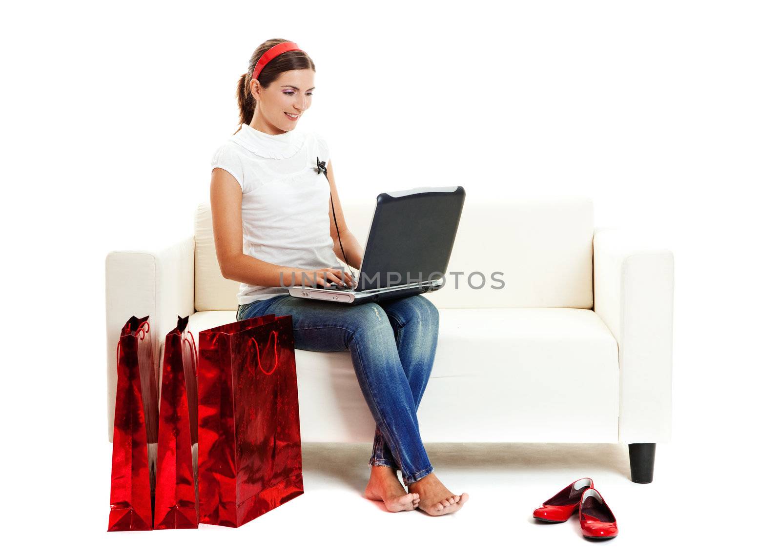 Beautiful young woman at home doing online shop, Consumerism concept
