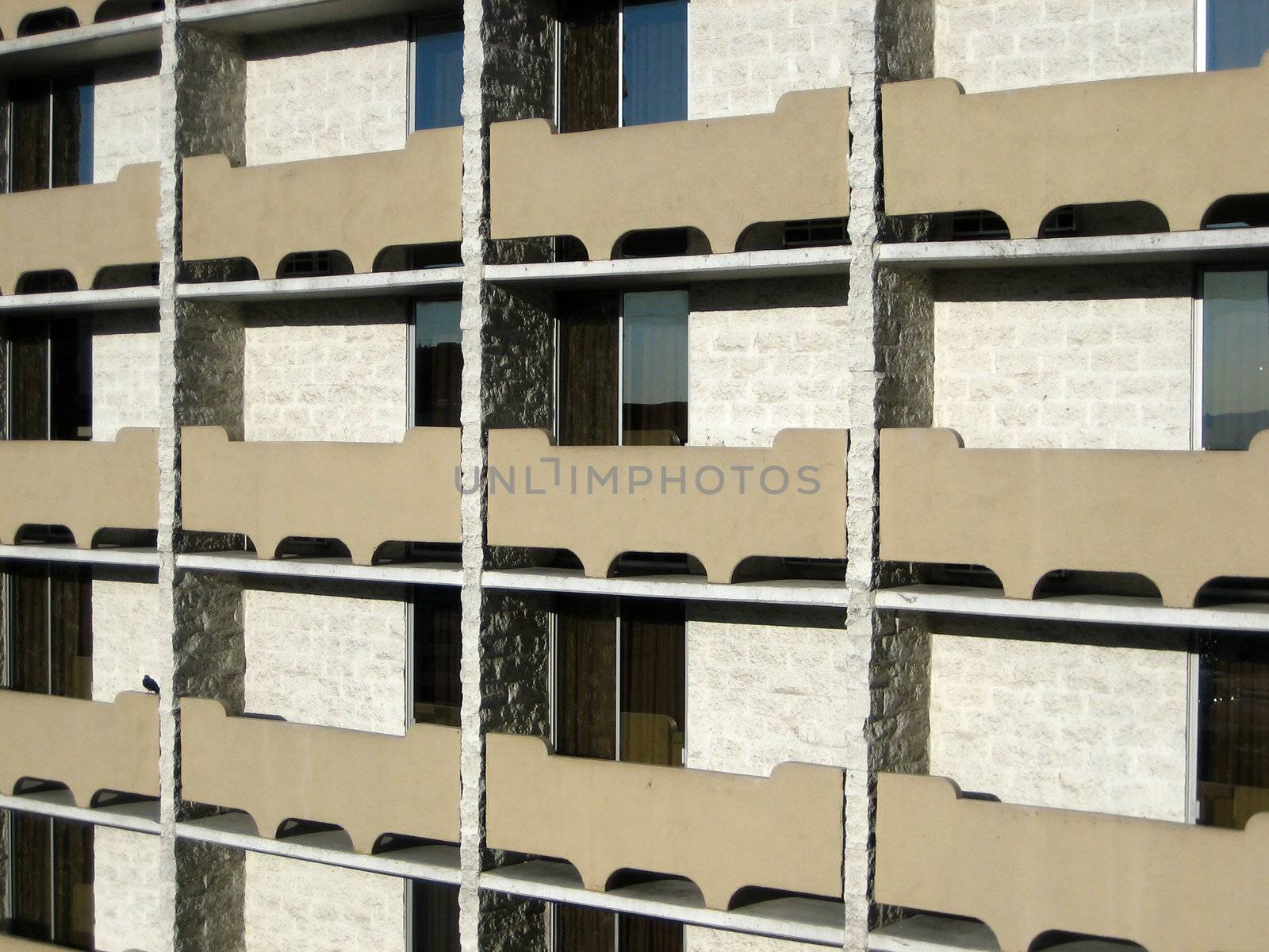 pictures of windows and high rise buildings in a city