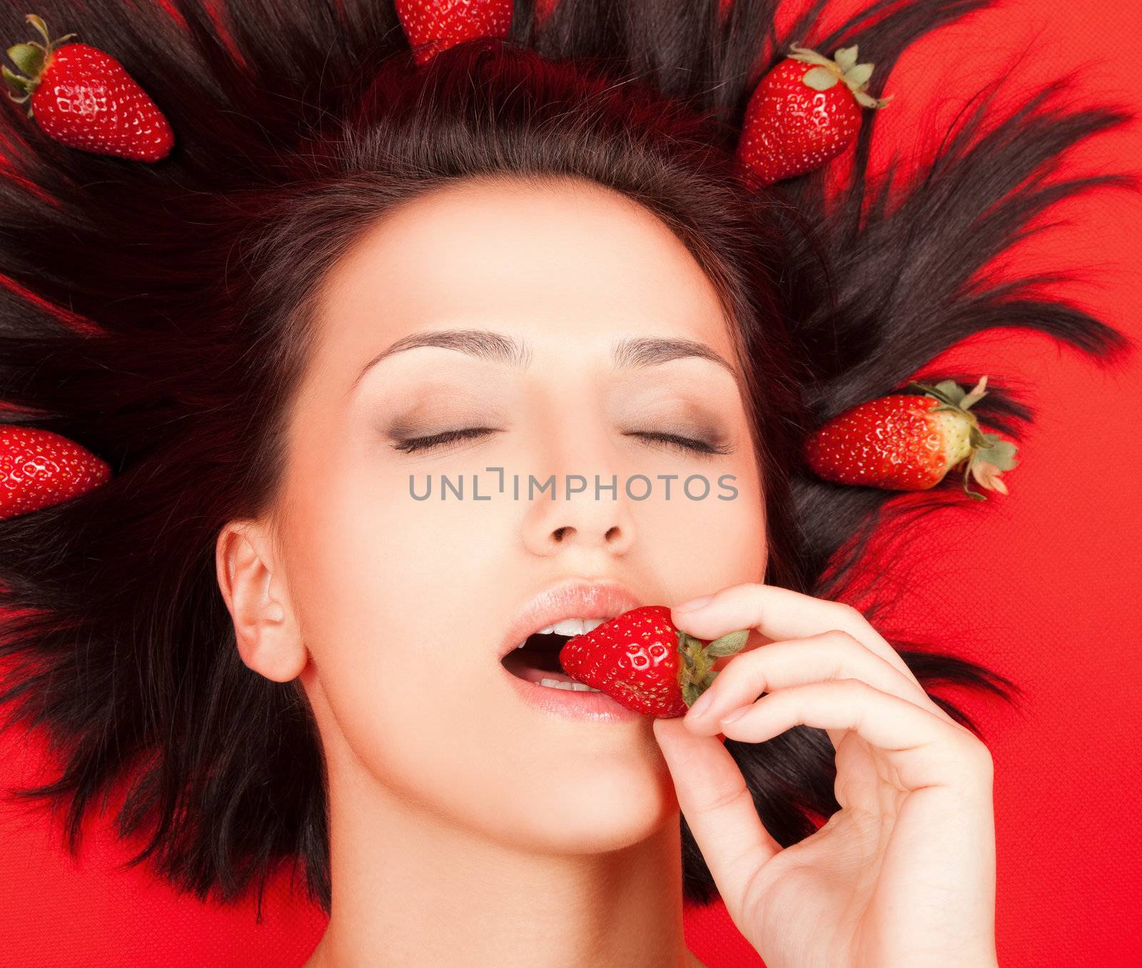Female with strawberries by vilevi