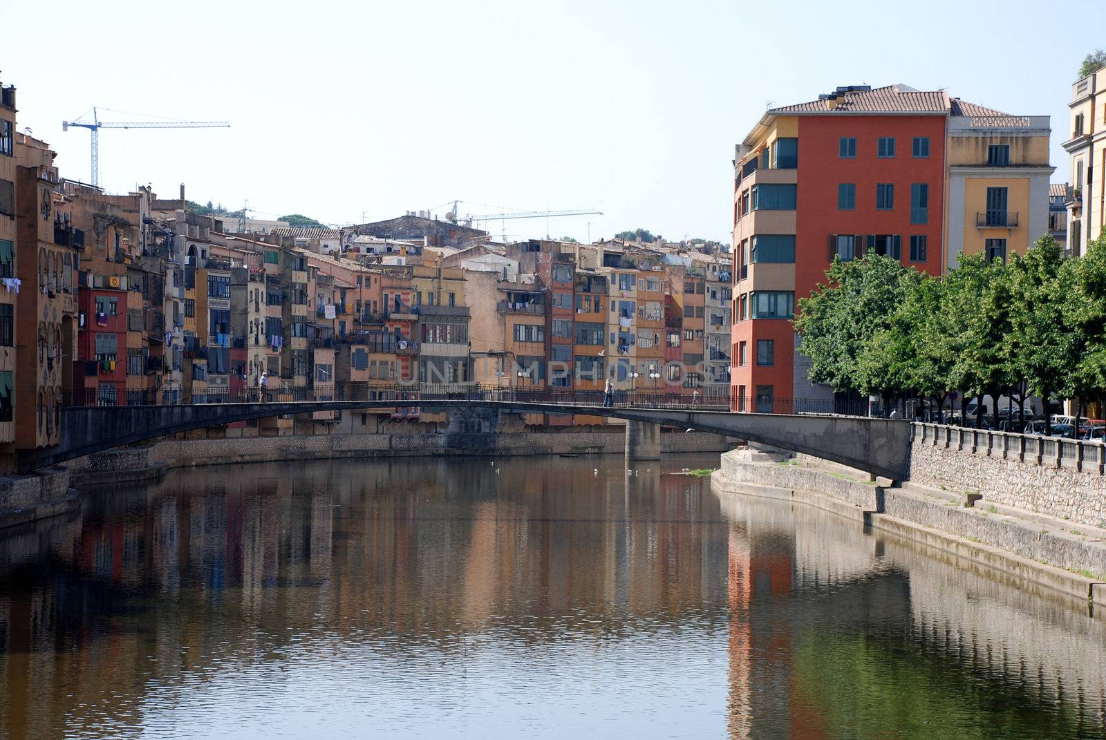 pictures of buildings and houses by the river