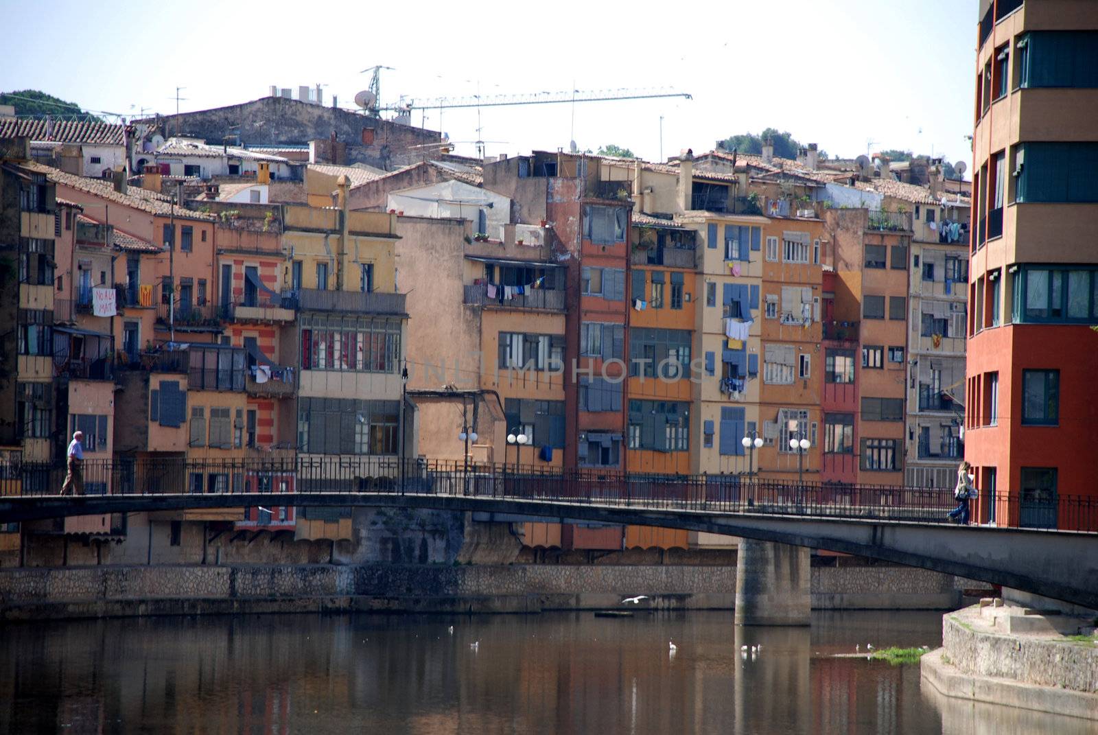 pictures of buildings and houses by the river