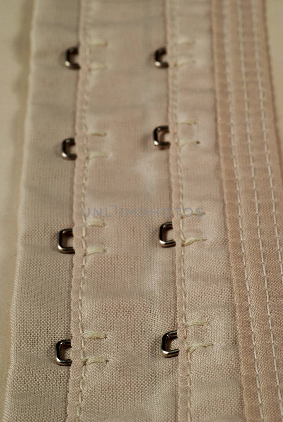 eyelets and hooks used in girdles and in corsets