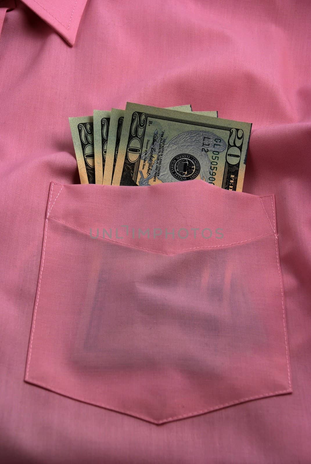  pictures of several twenty dollar bills in the pocket of a shirt