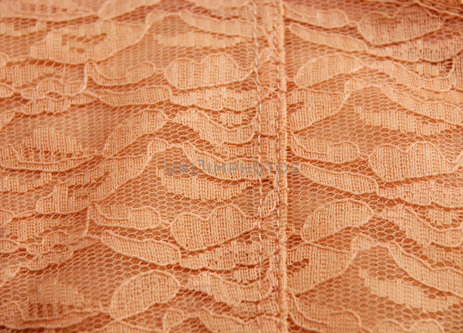 Pictures of a pretty and intricate design on a piece of clothing