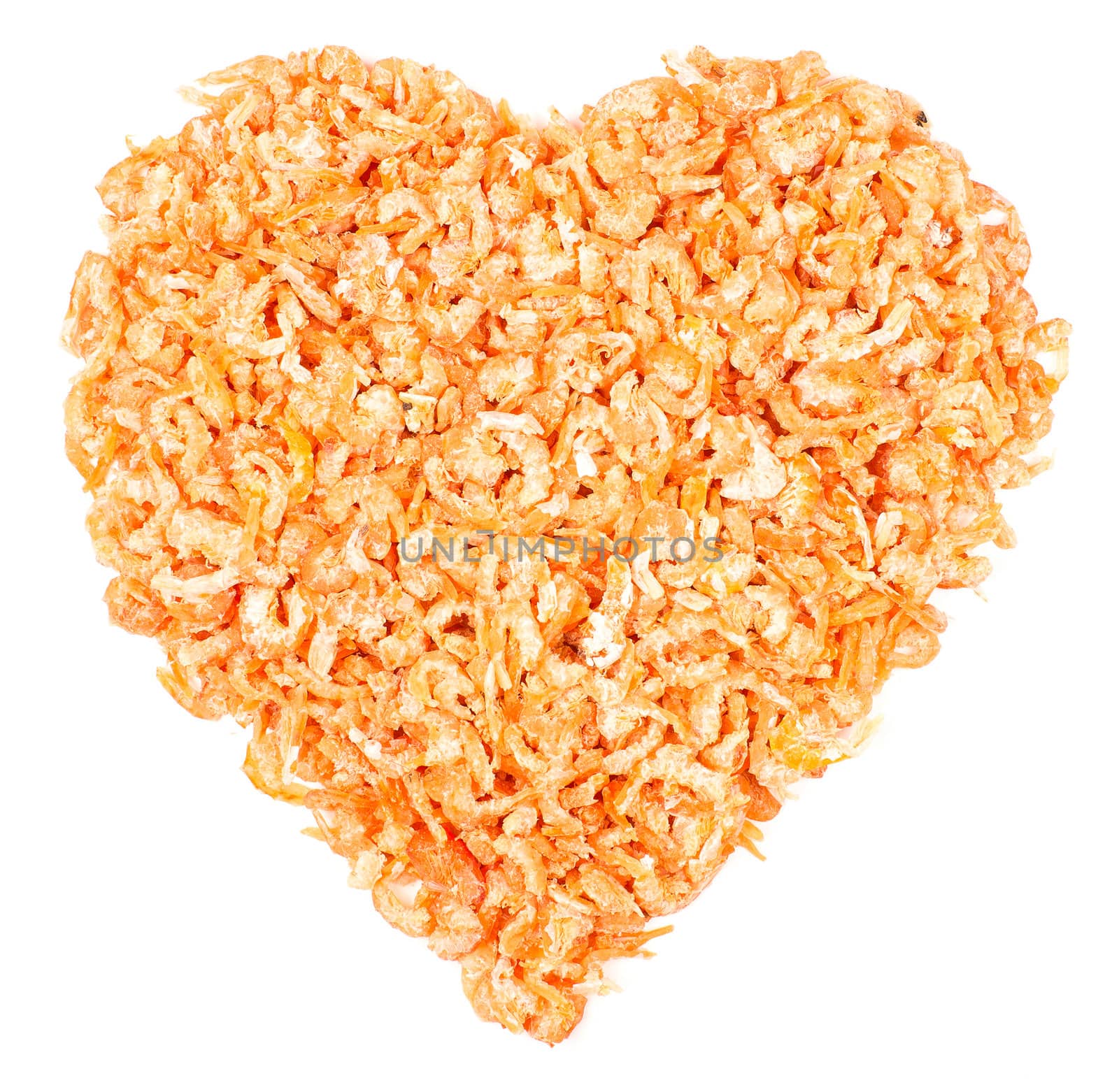 Heart made of dried shrimps, isolated on a white background