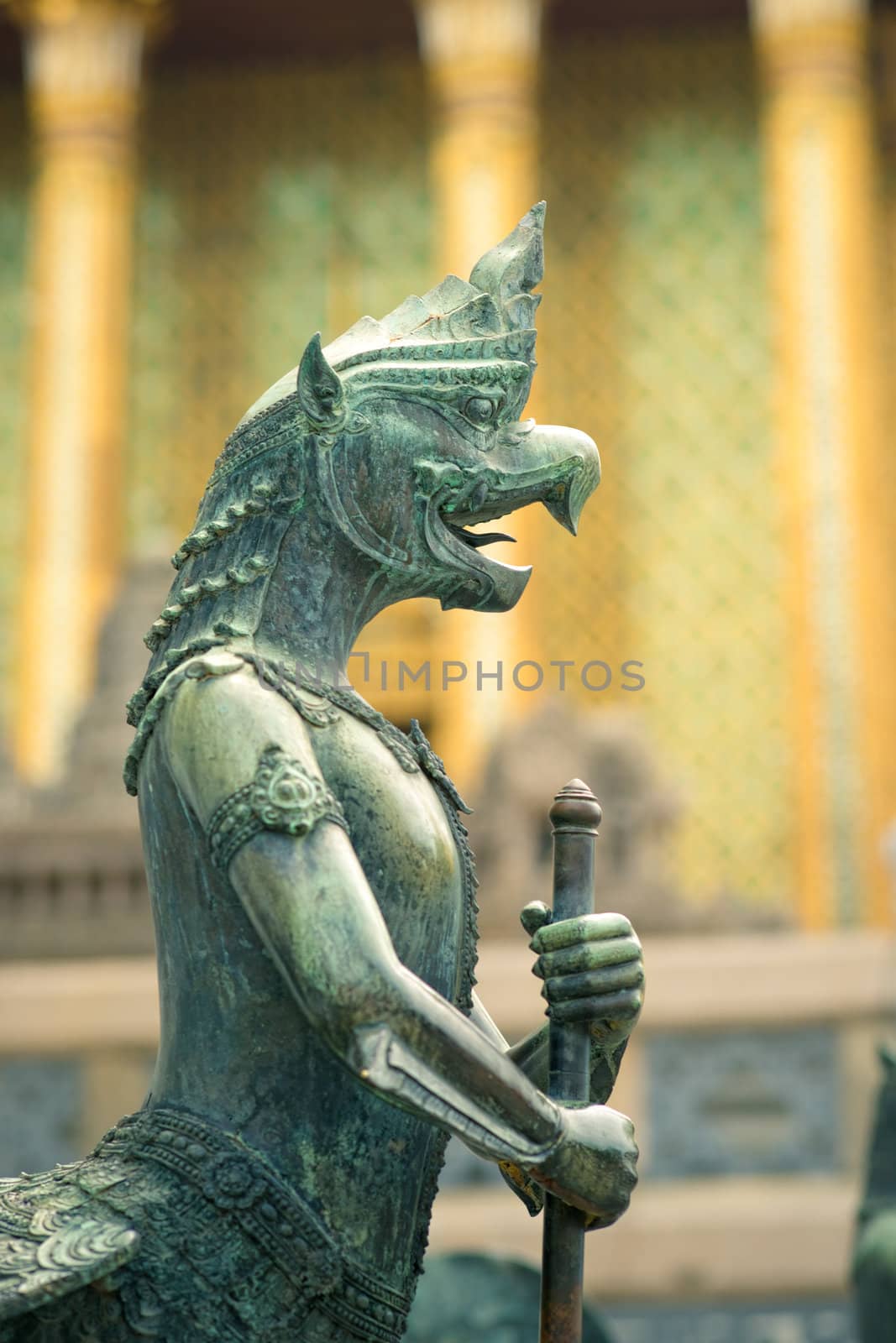 Sculpture of mythological warrior in Grand Palace, Bangkok, Thailand