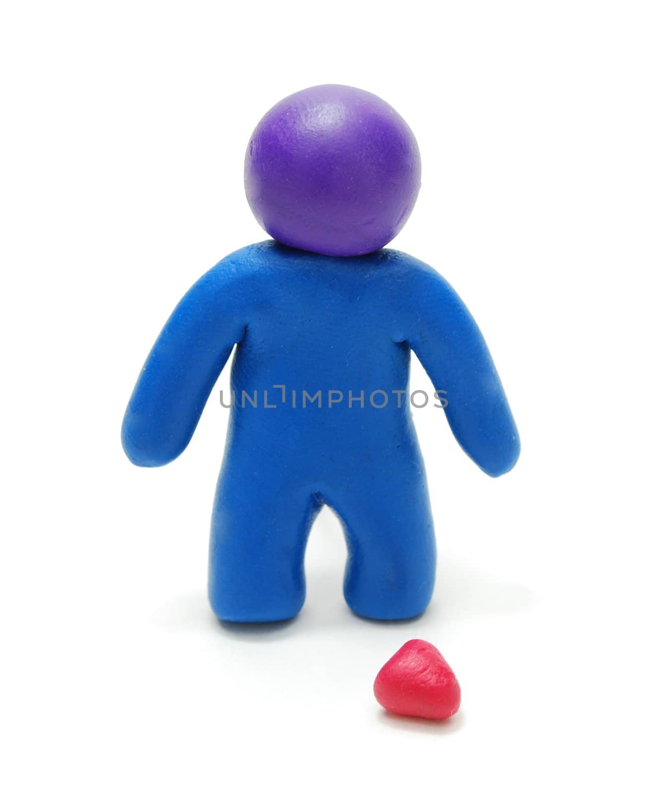 3D Blue Plasticine Man Figure Standing  in Sadness near Dropped Red Heart