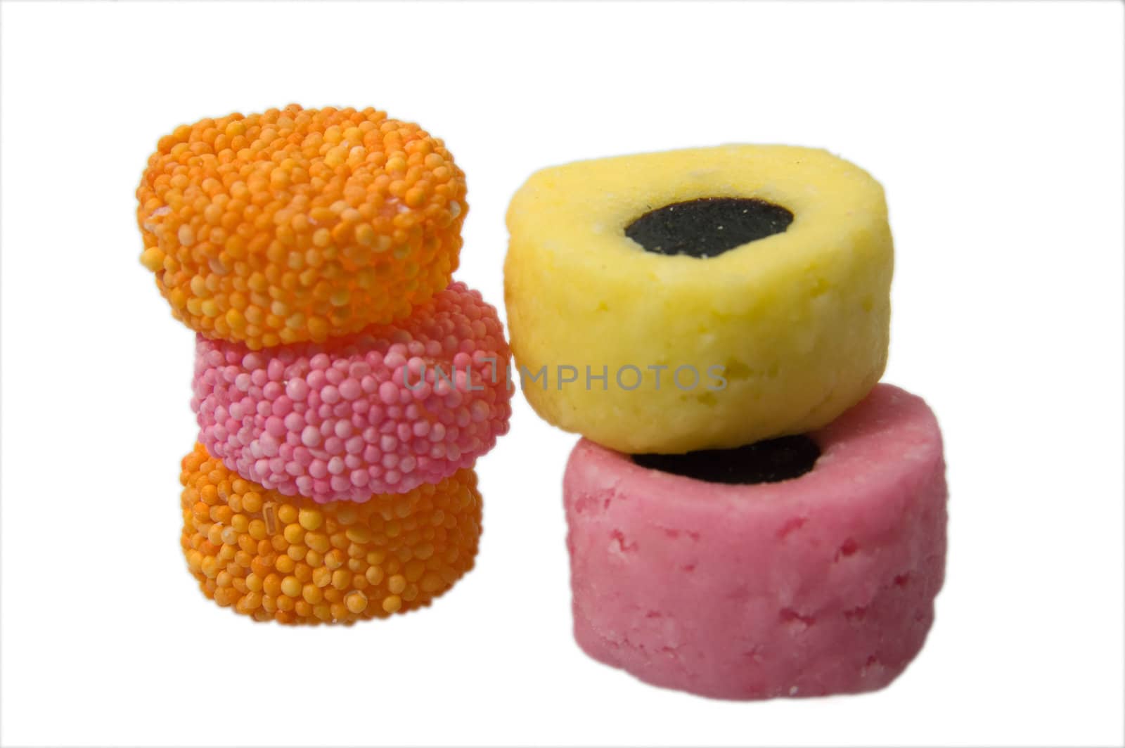 A Colourful Photo of Sweets and Candy on a Isolated Background