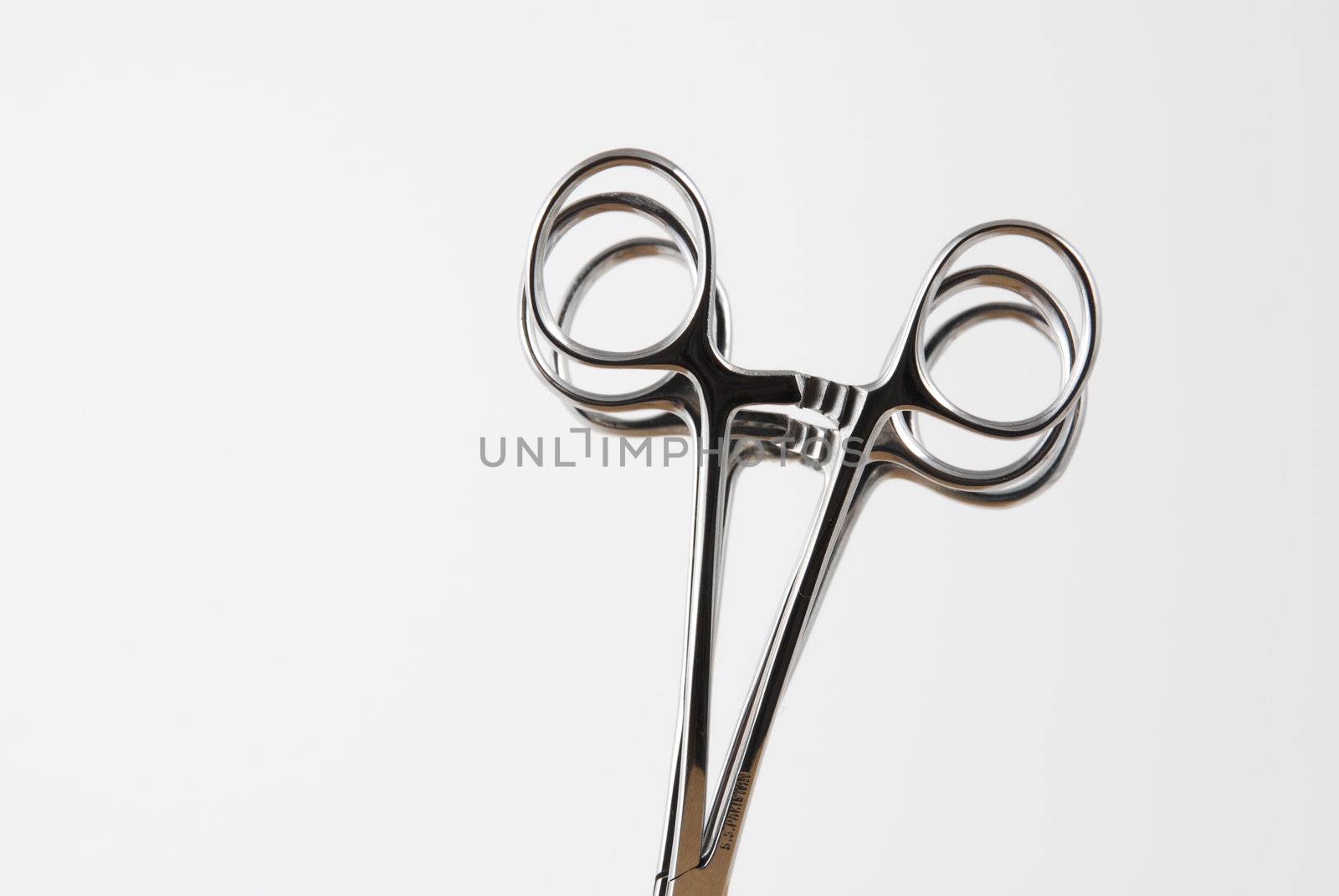 Stock pictures of hemostats used in surgery and in the clinical practice