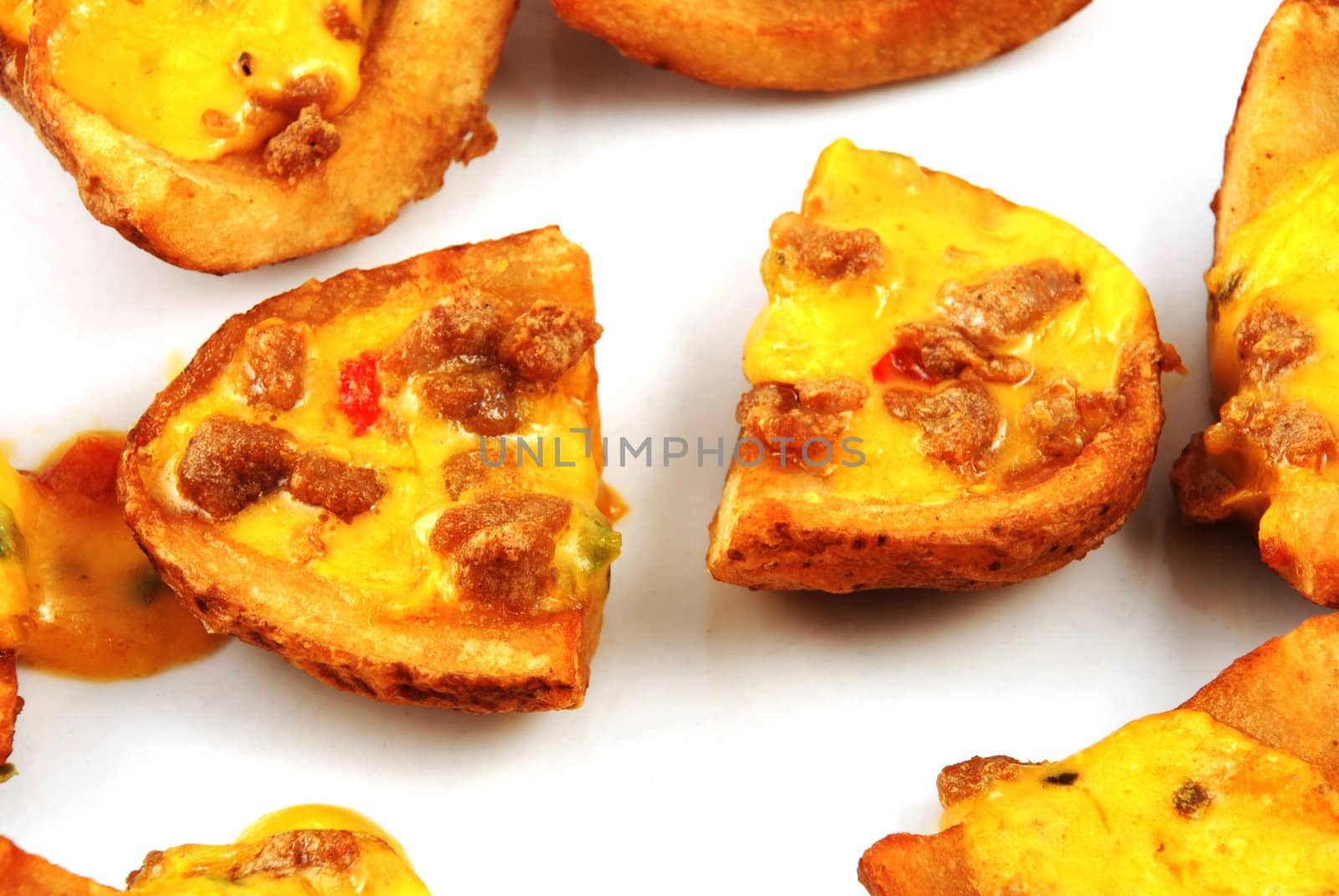 Stock pictures of potato skins loaded with chesse and bacon 