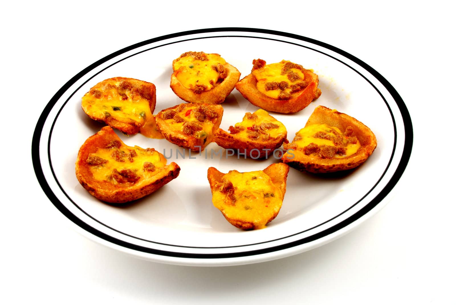 Stock pictures of potato skins loaded with chesse and bacon 