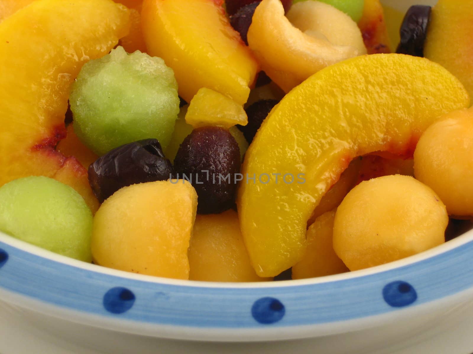 Bowl with different healthy and nutritious fruits