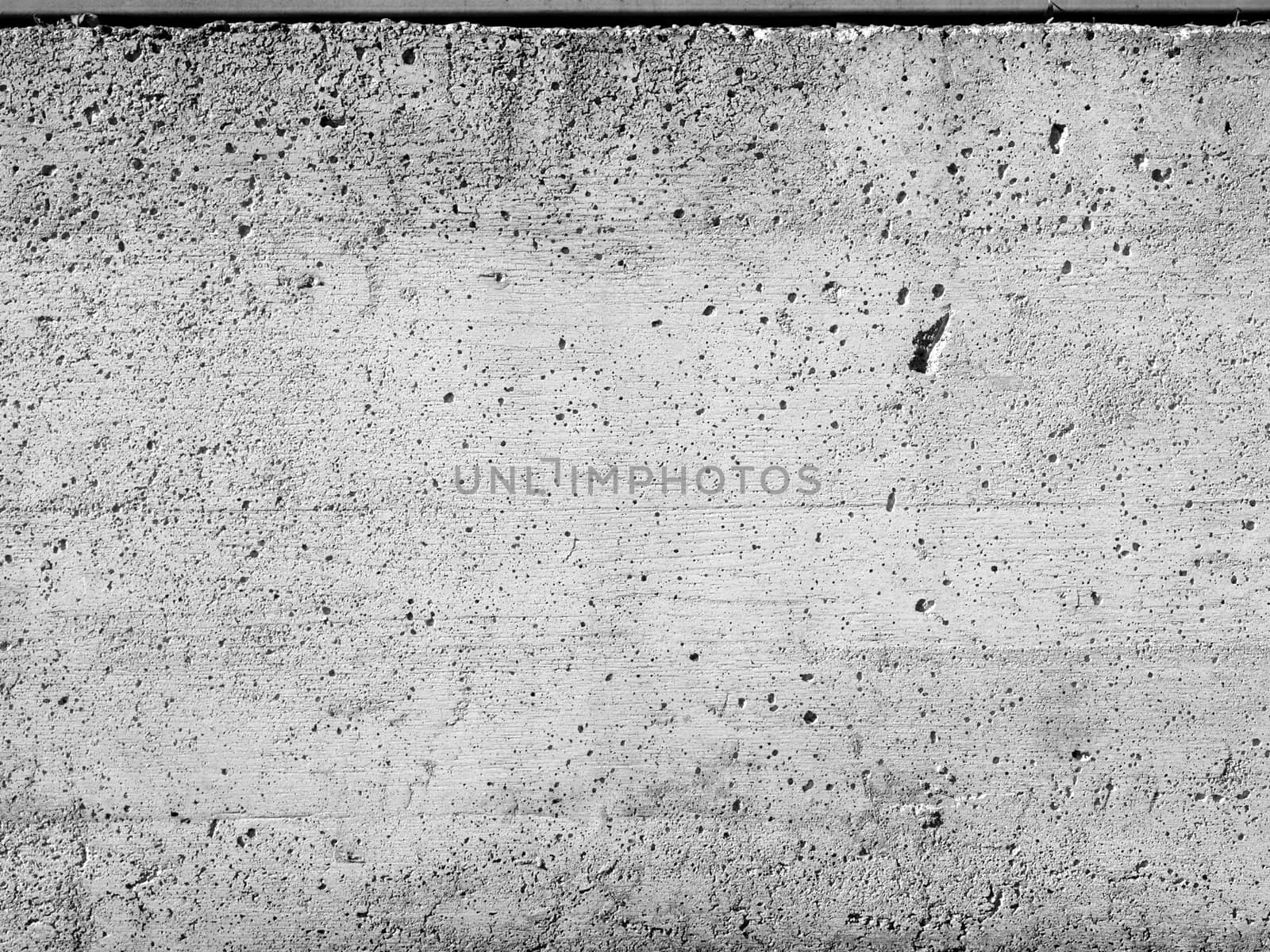 Reinforced concrete wall useful as a background